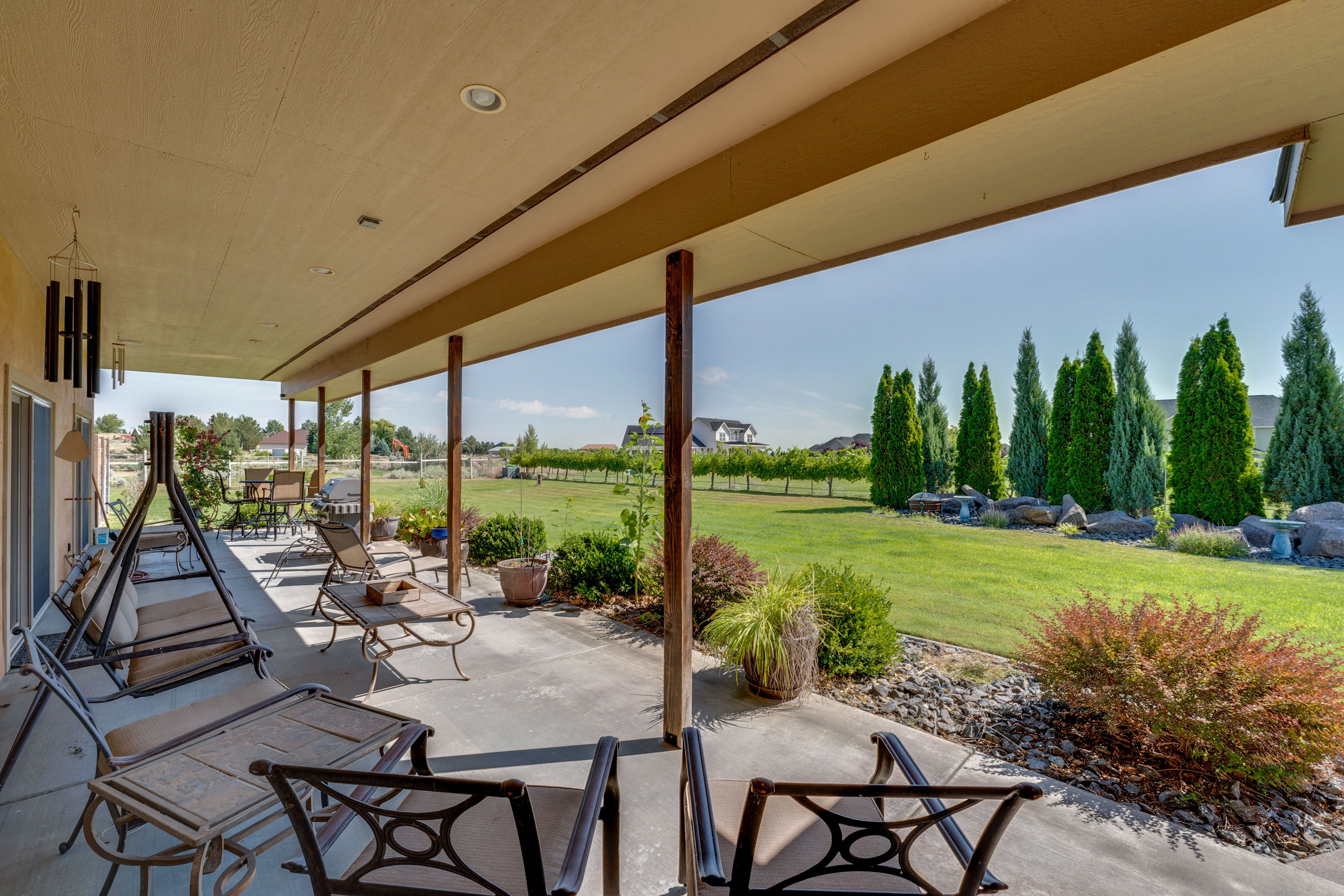 Private Backyard Area | Covered Patio | Weber Genesis Grill