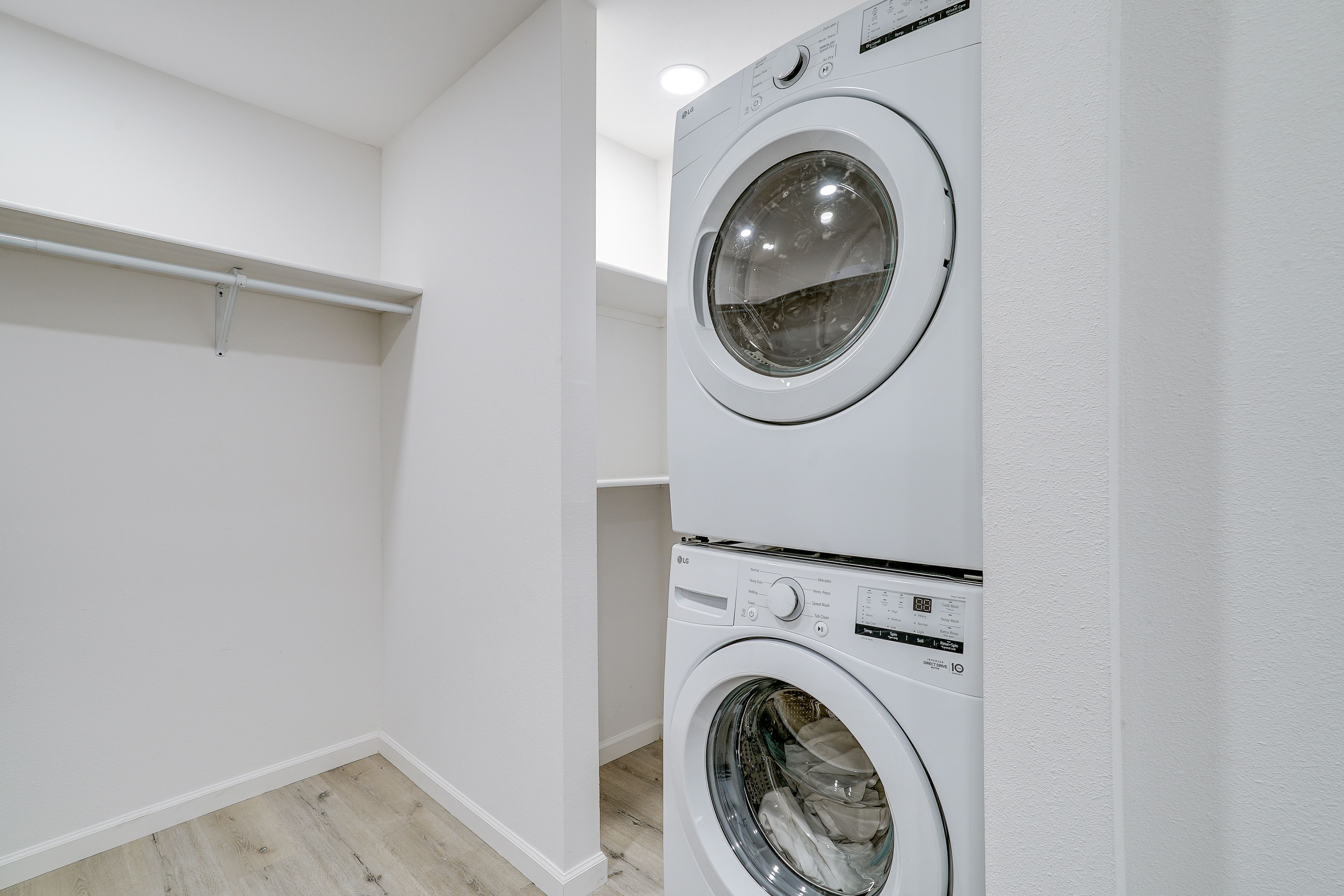 In-Unit Laundry | Stackable Washer + Dryer | Iron/Board