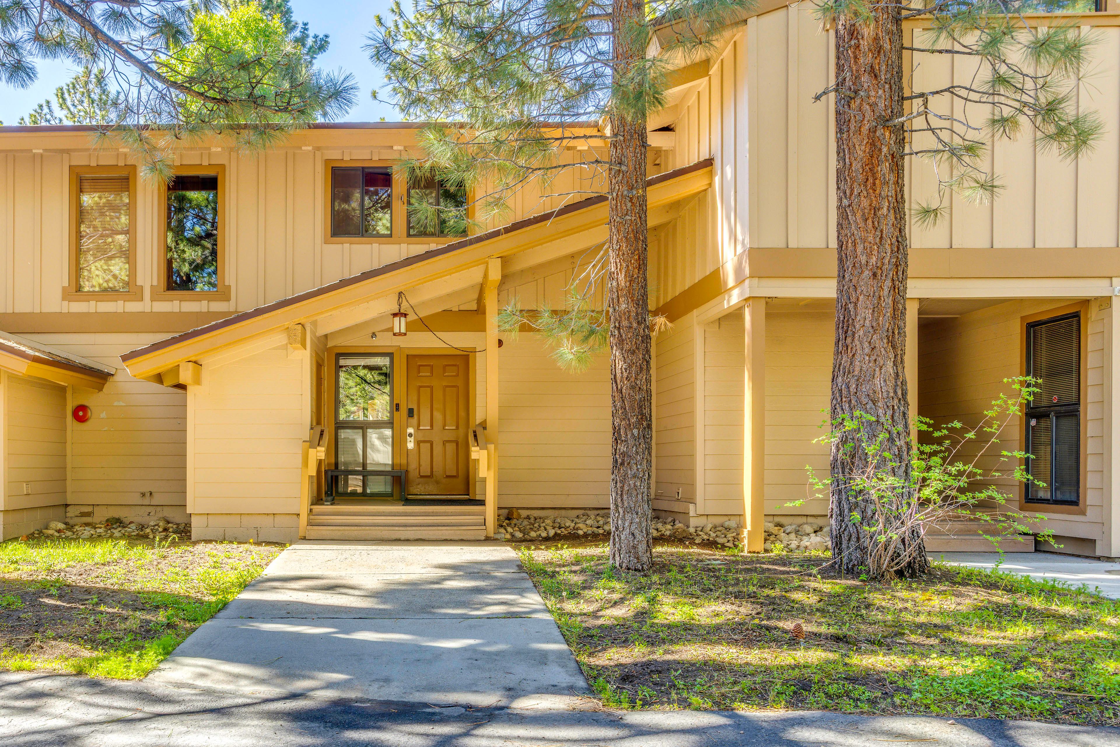 Condo Exterior | Parking | Community Lot (2 Vehicles, First-Come, First-Served)