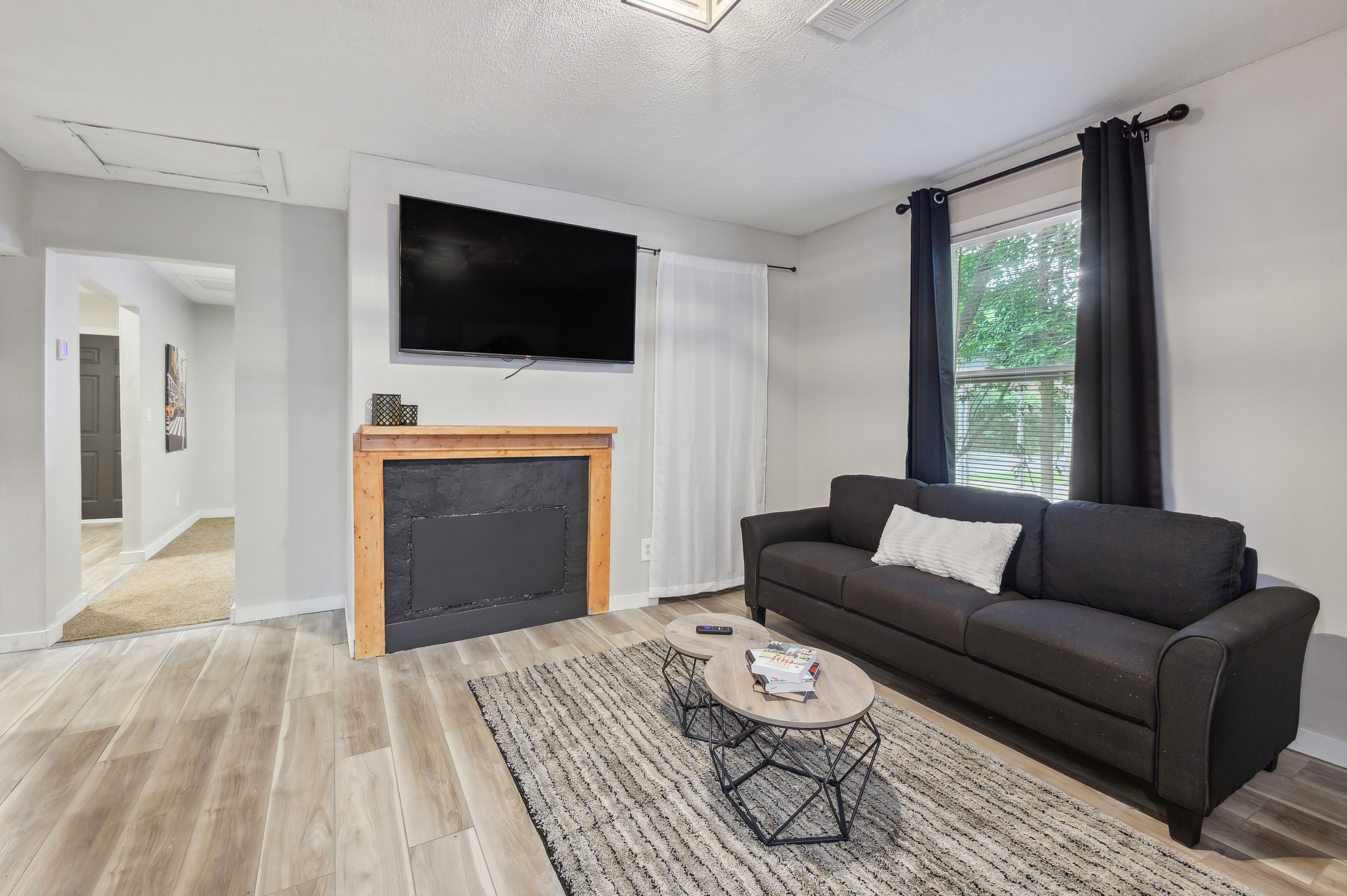 Living Room | Central Heating & A/C | In-Unit Laundry | 2 Mi to Downtown