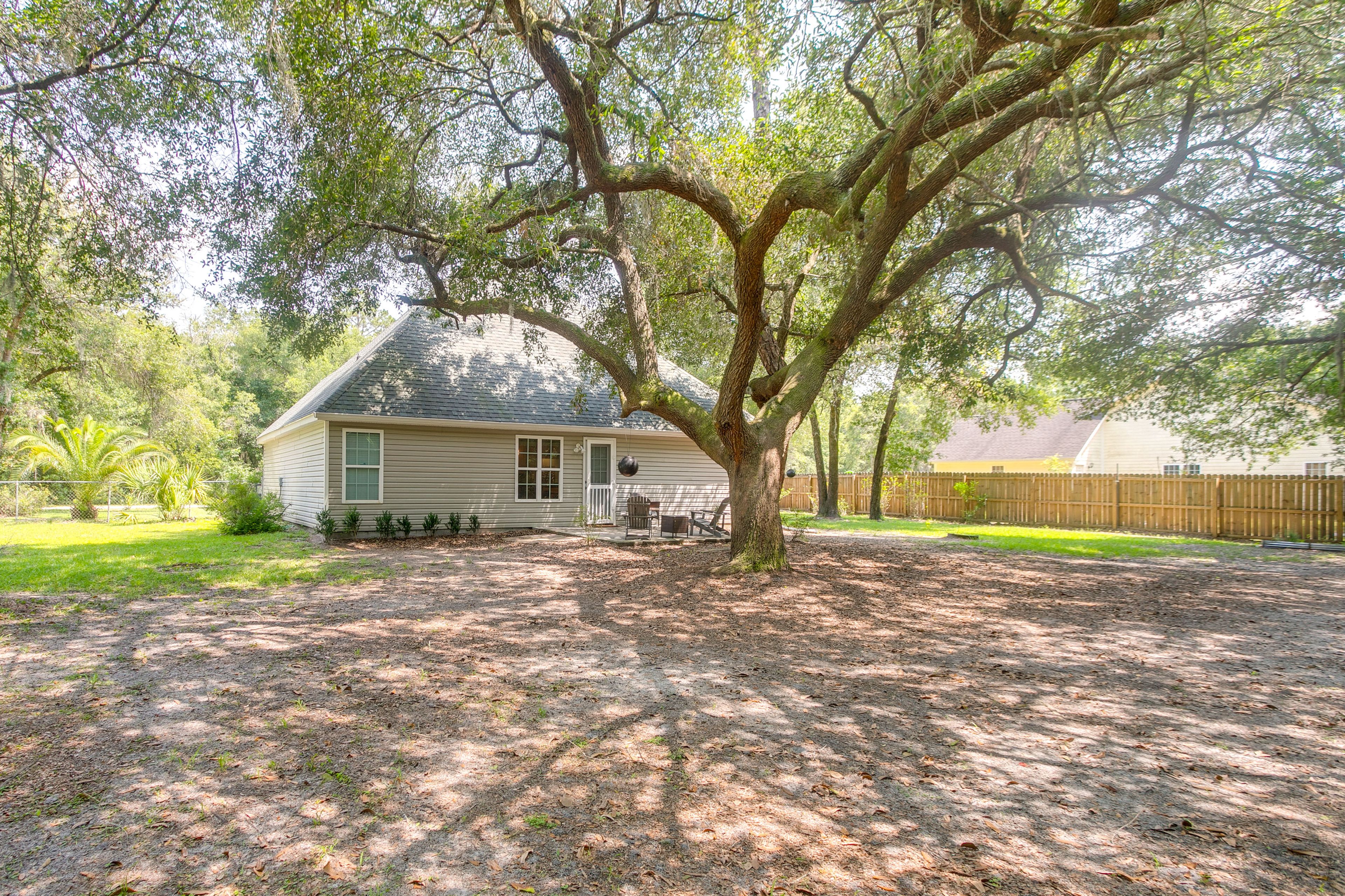 House Exterior | Furnished Patio | Dining Area | Charcoal Grill | Fire Pit