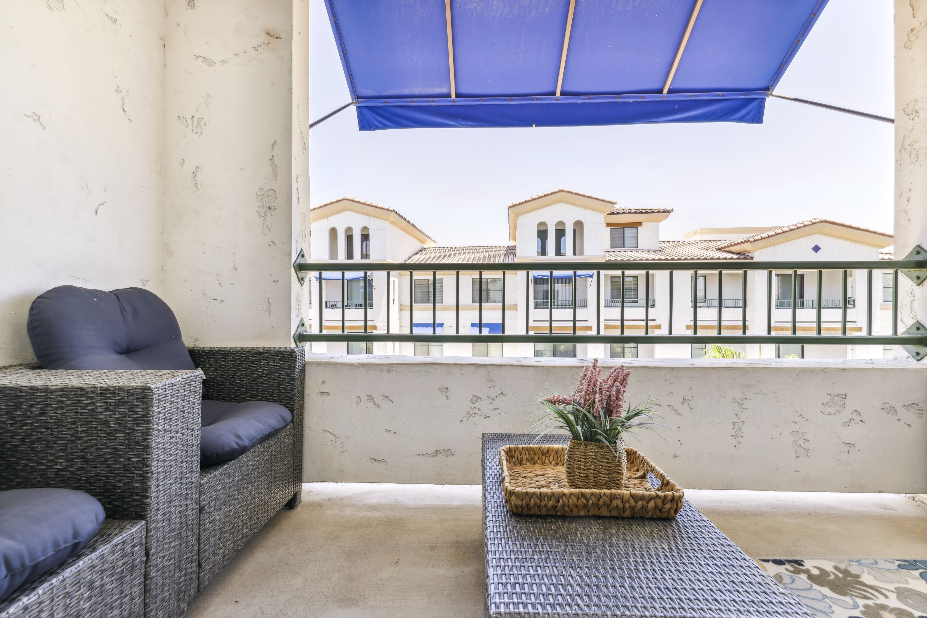 Condo Exterior | Parking | Community Garage (2 Vehicles) | Free Street Parking