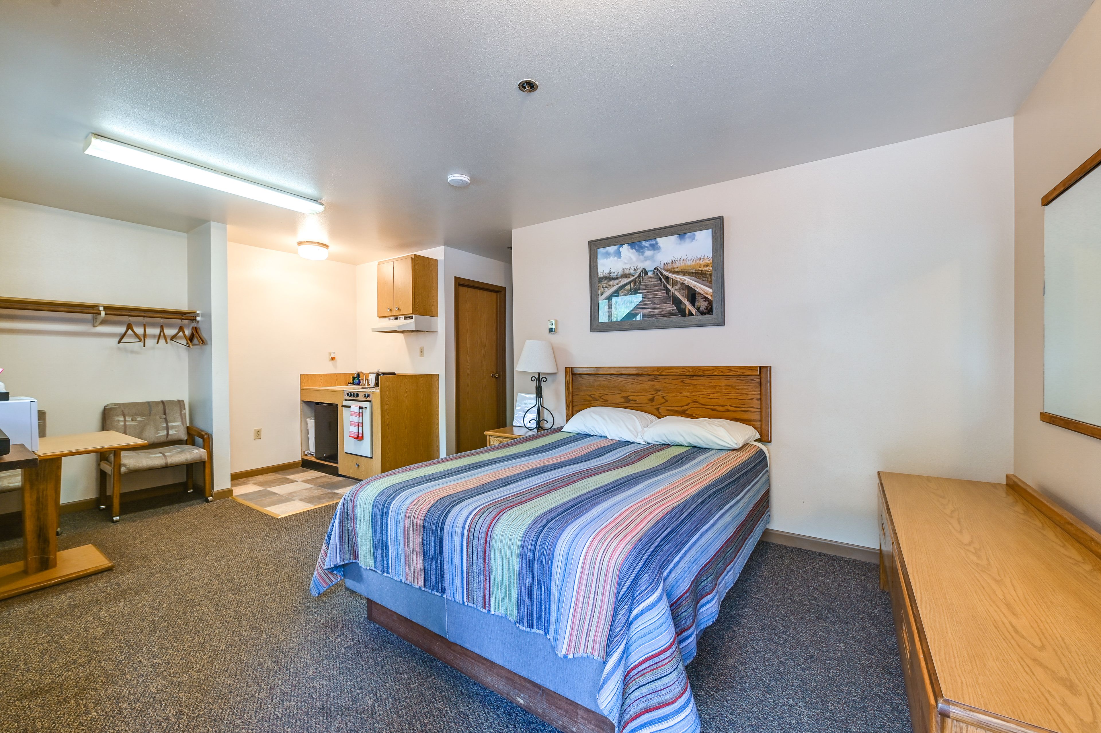 Studio | Living & Sleeping Space | Queen Bed