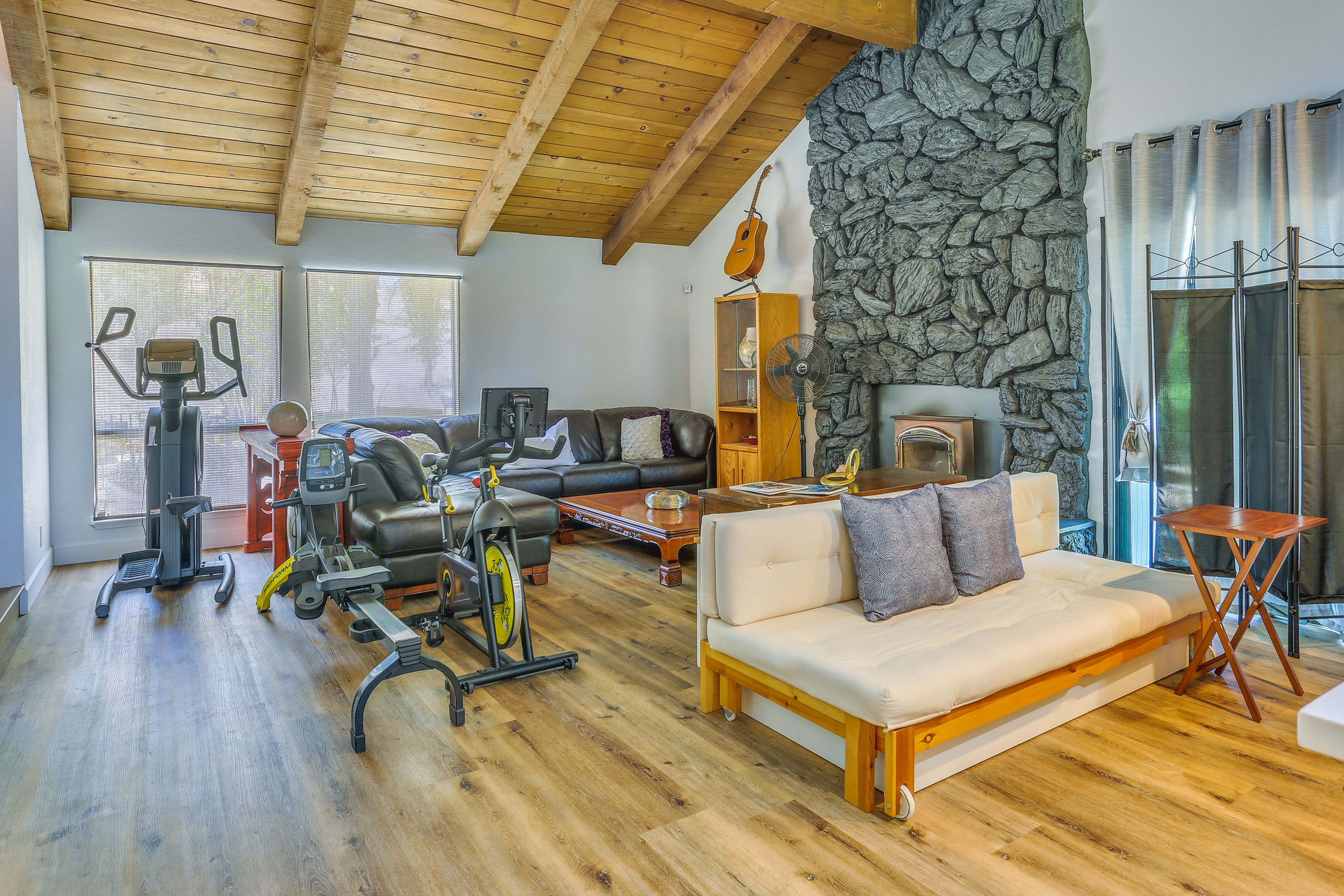 Living Area | Home Gym Equipment | Wood-Burning Stove | Smart TV