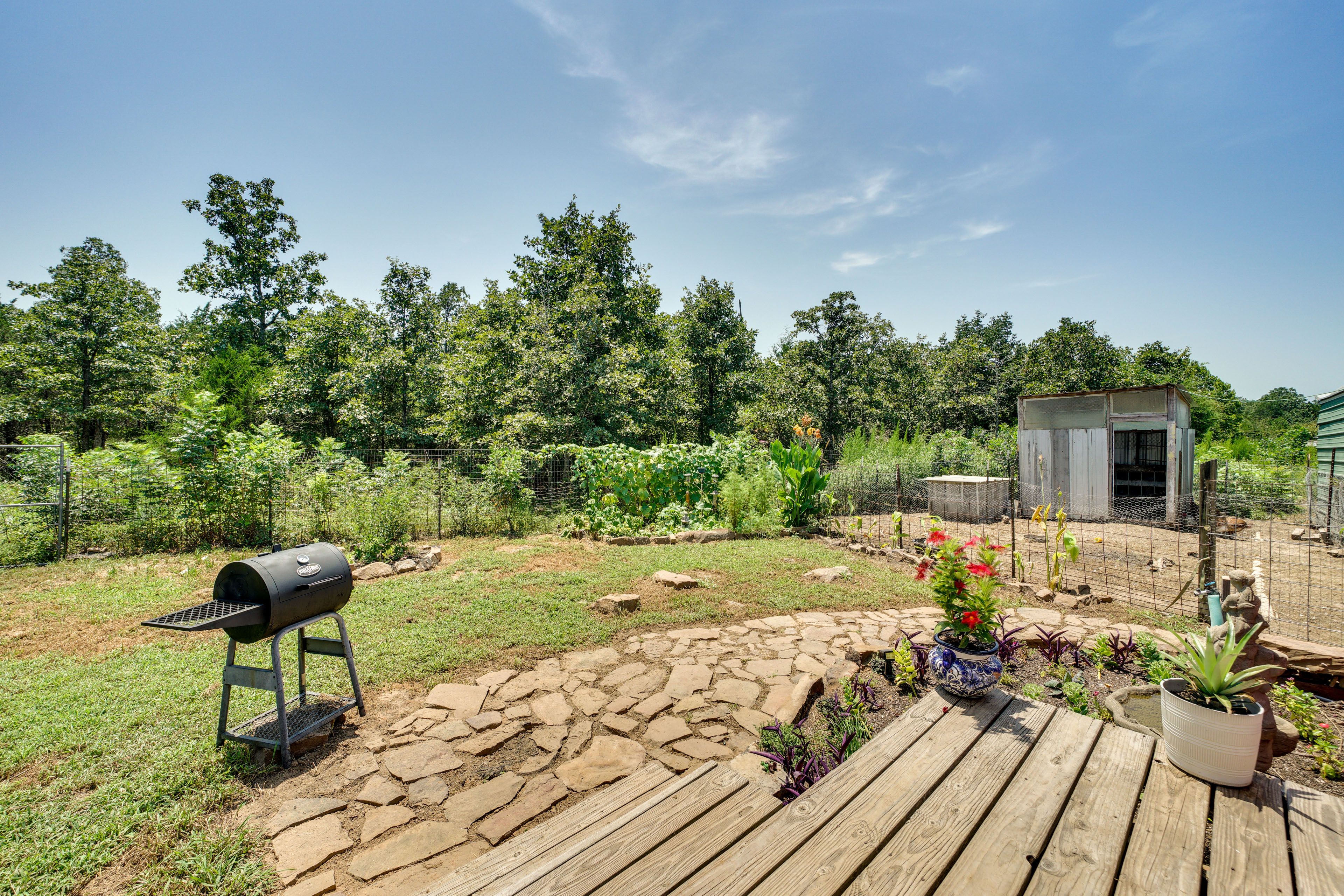 Fenced Yard | Lounge Seating | Charcoal Grill