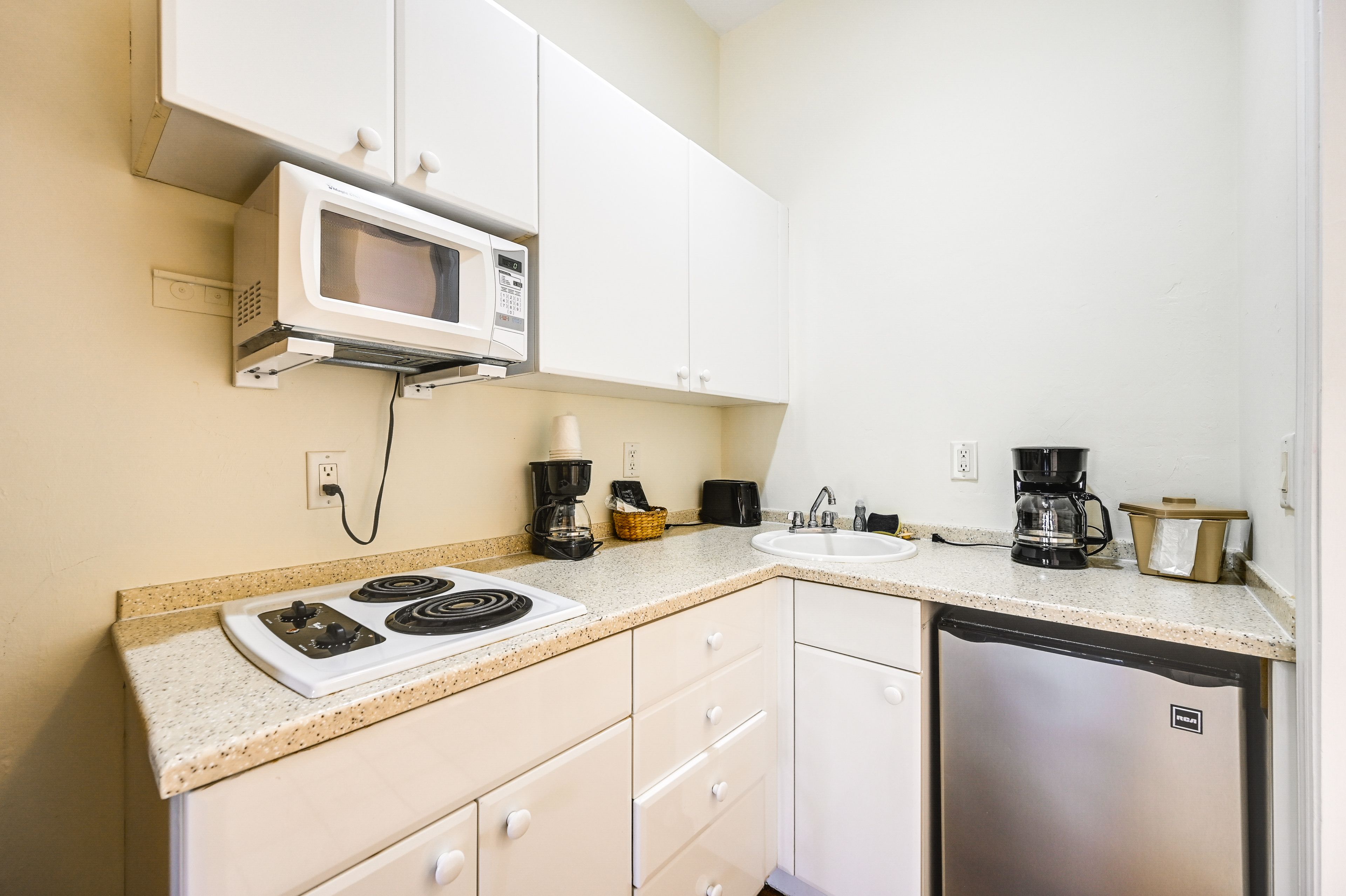 Kitchenette | Mini Fridge | Coffee Maker | Dishware & Flatware Provided