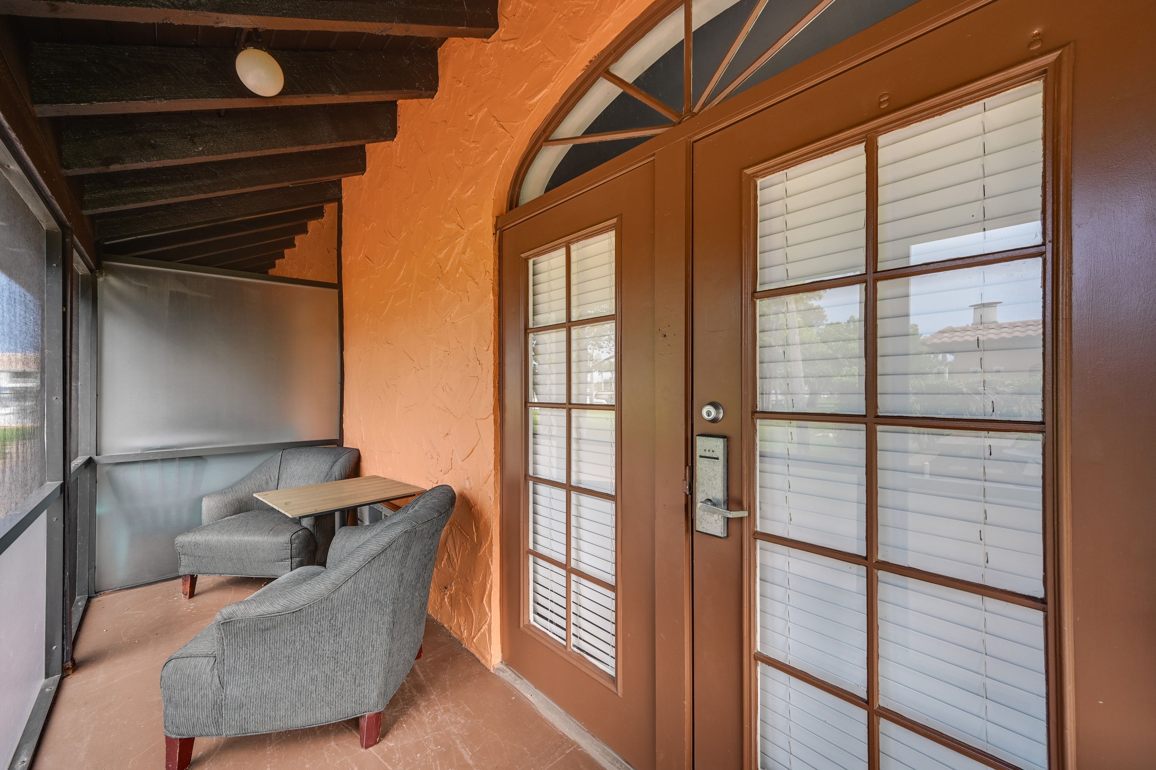 Unit Entrance | Screened-In Porch