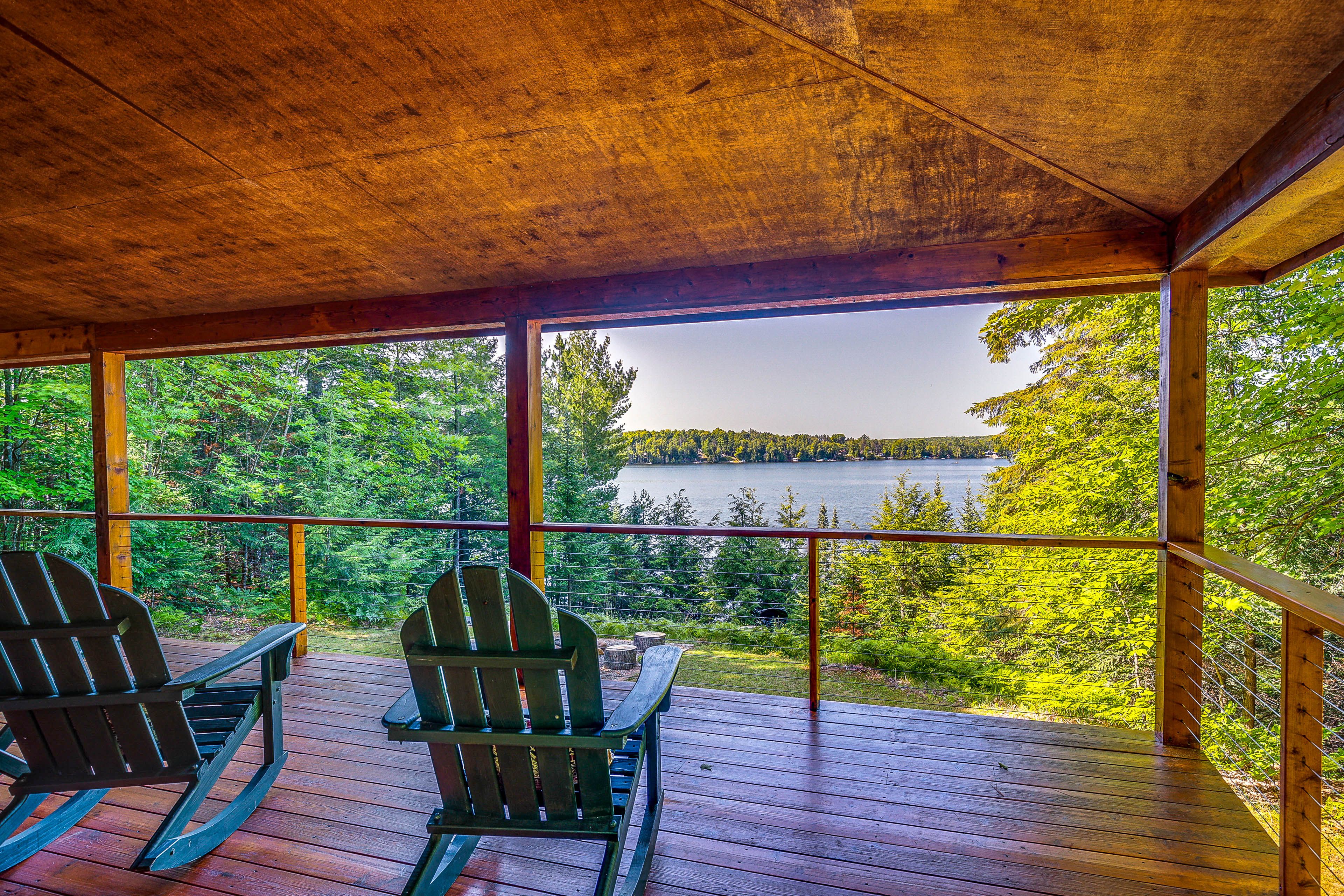 Wraparound Porch | Lake View | Rocking Adirondack Chairs
