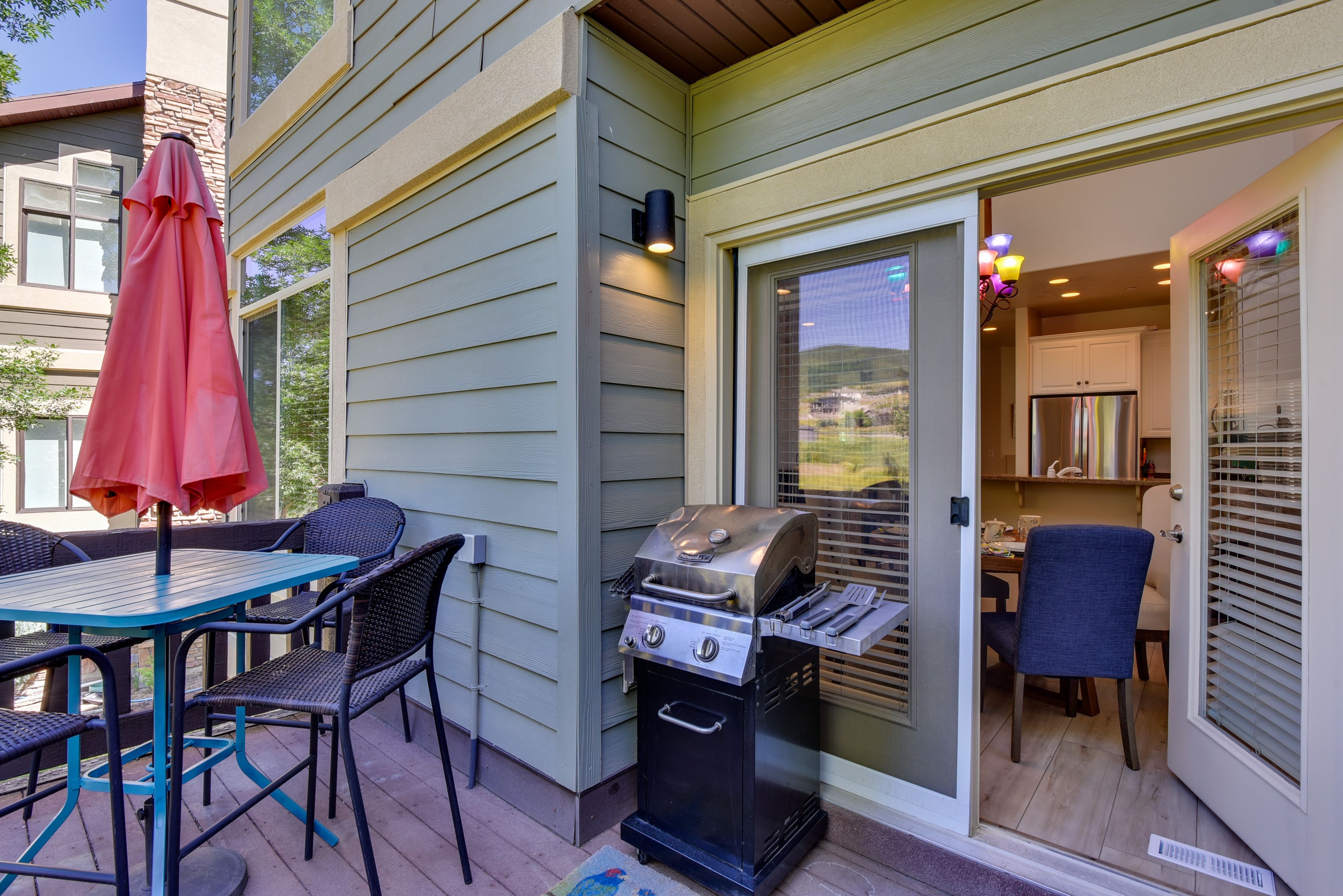 Condo Exterior | Furnished Deck | Dining Area | Gas Grill