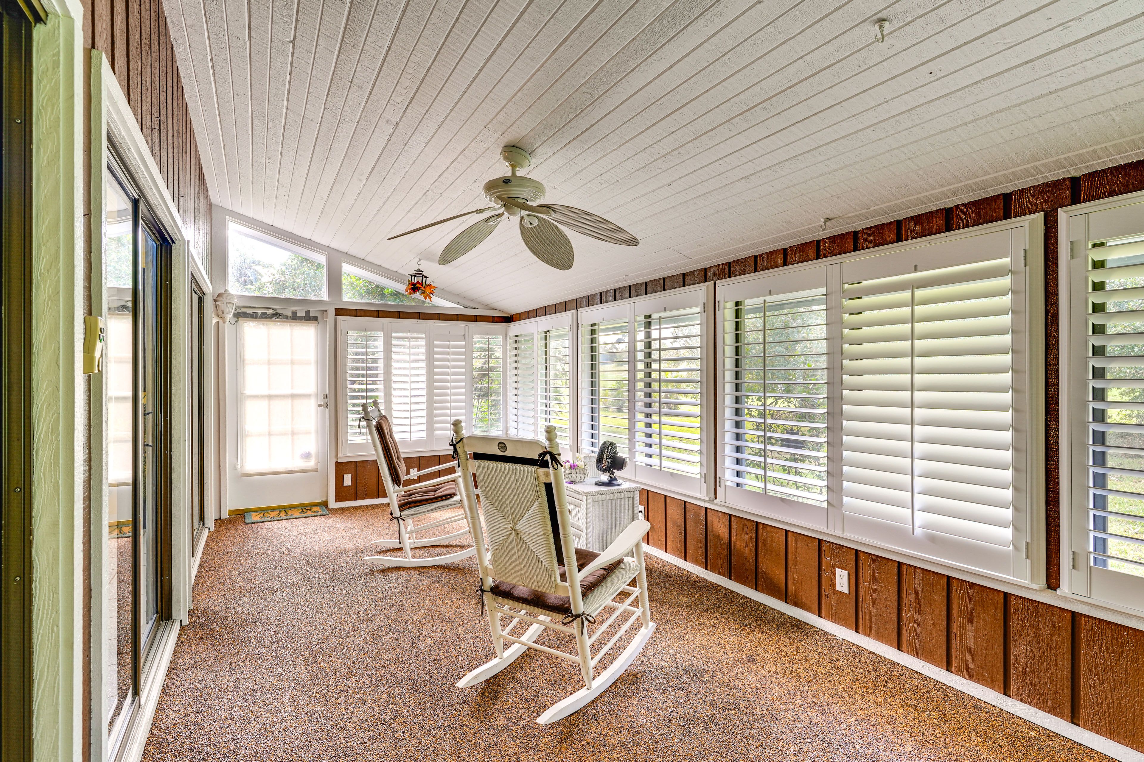 Townhome Exterior | Furnished Sunroom