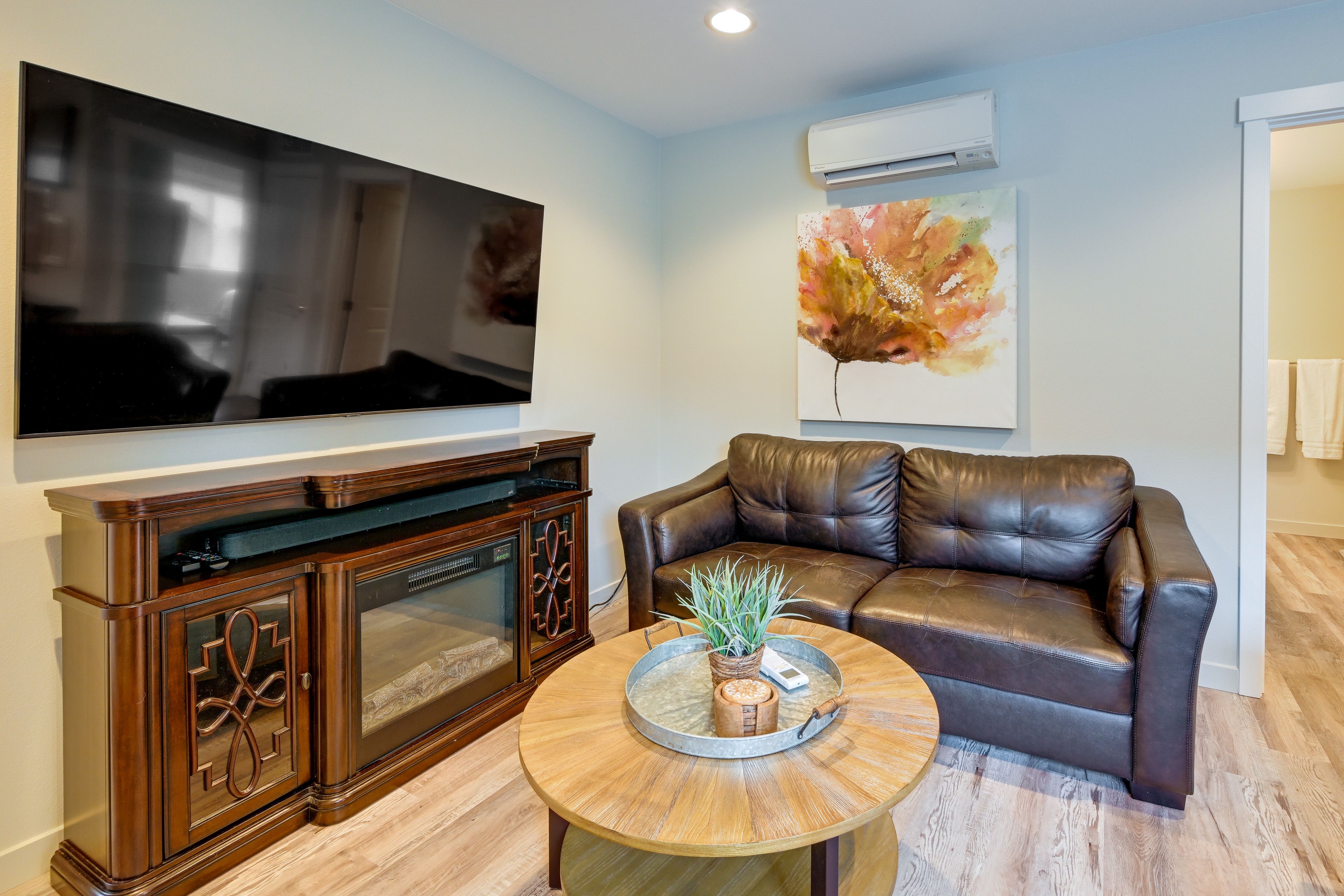 Living Area | Smart TV | Electric Fireplace | Window A/C Units