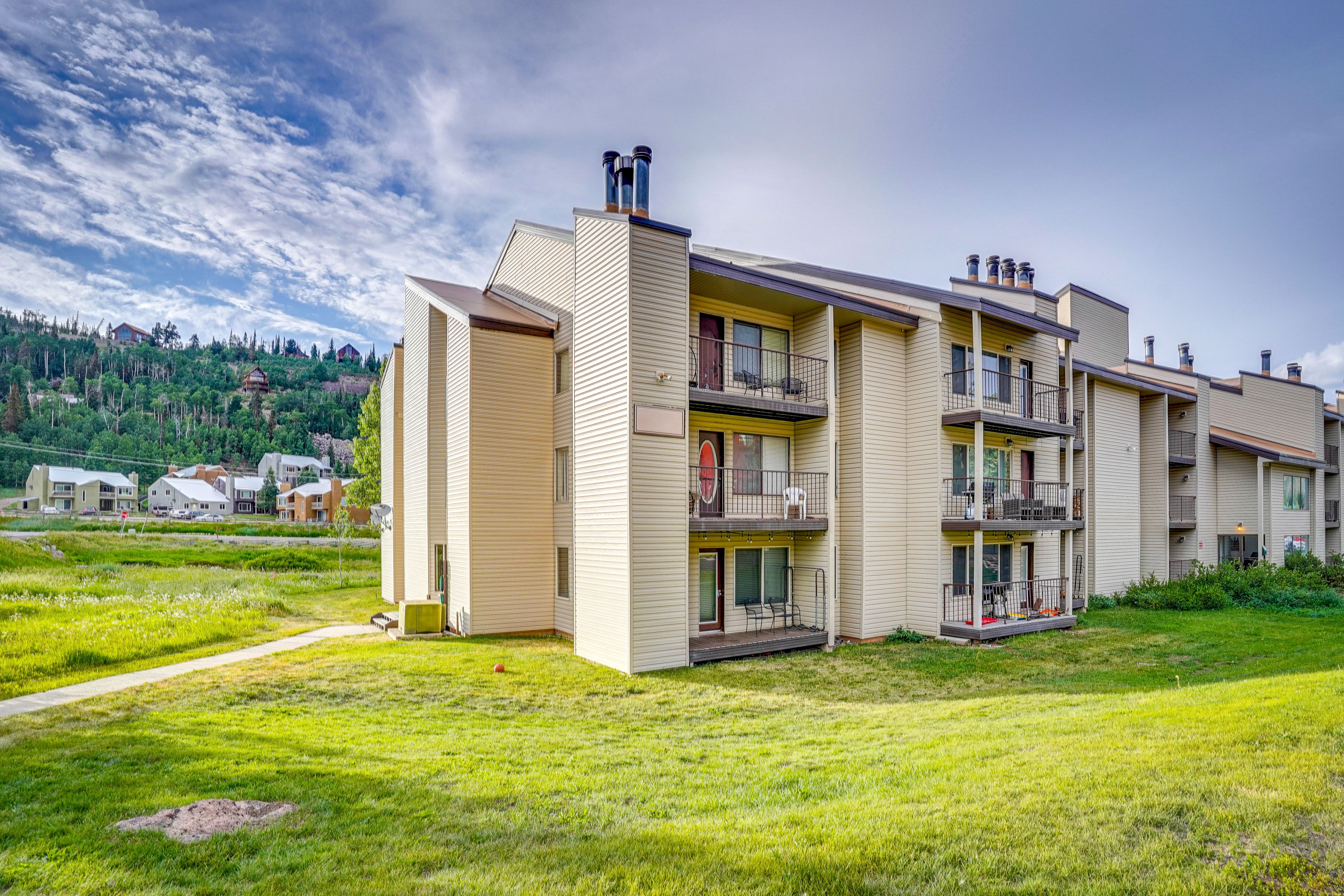 Property Exterior | Parking | Community Lot (2 Vehicles)