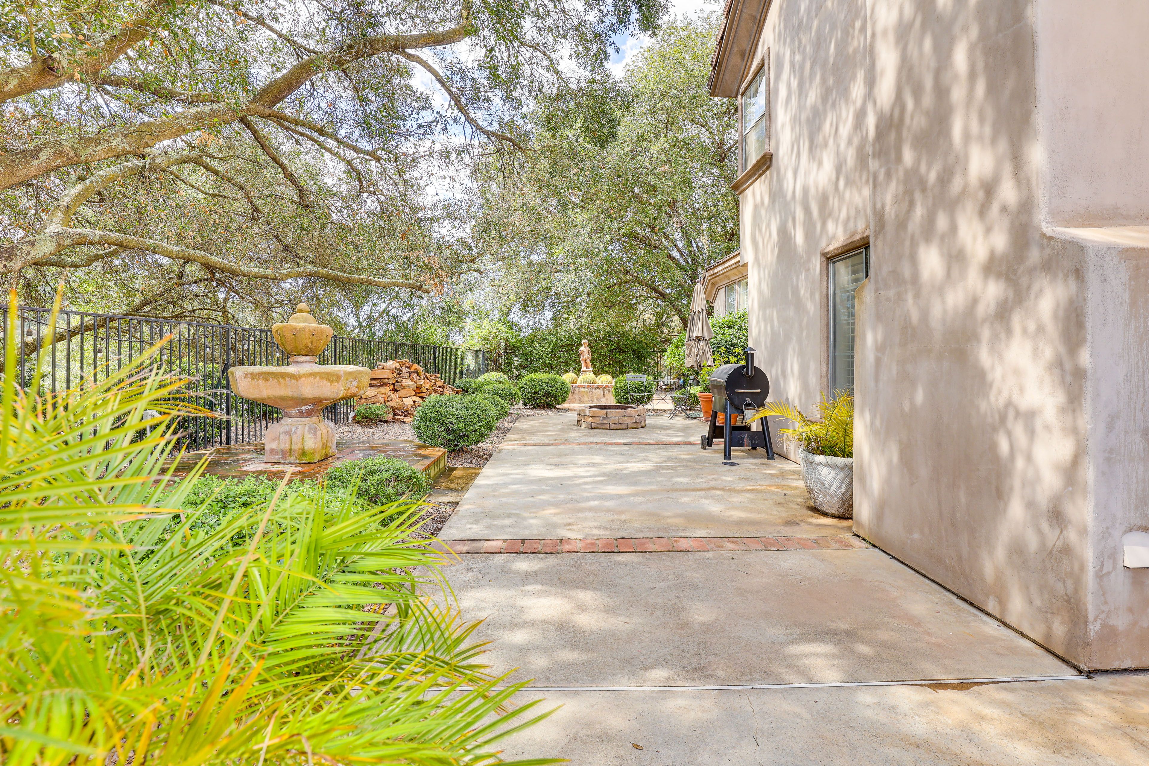 Private Backyard Area | Outdoor Pool | Gas Grill | Wood-Burning Fire Pit