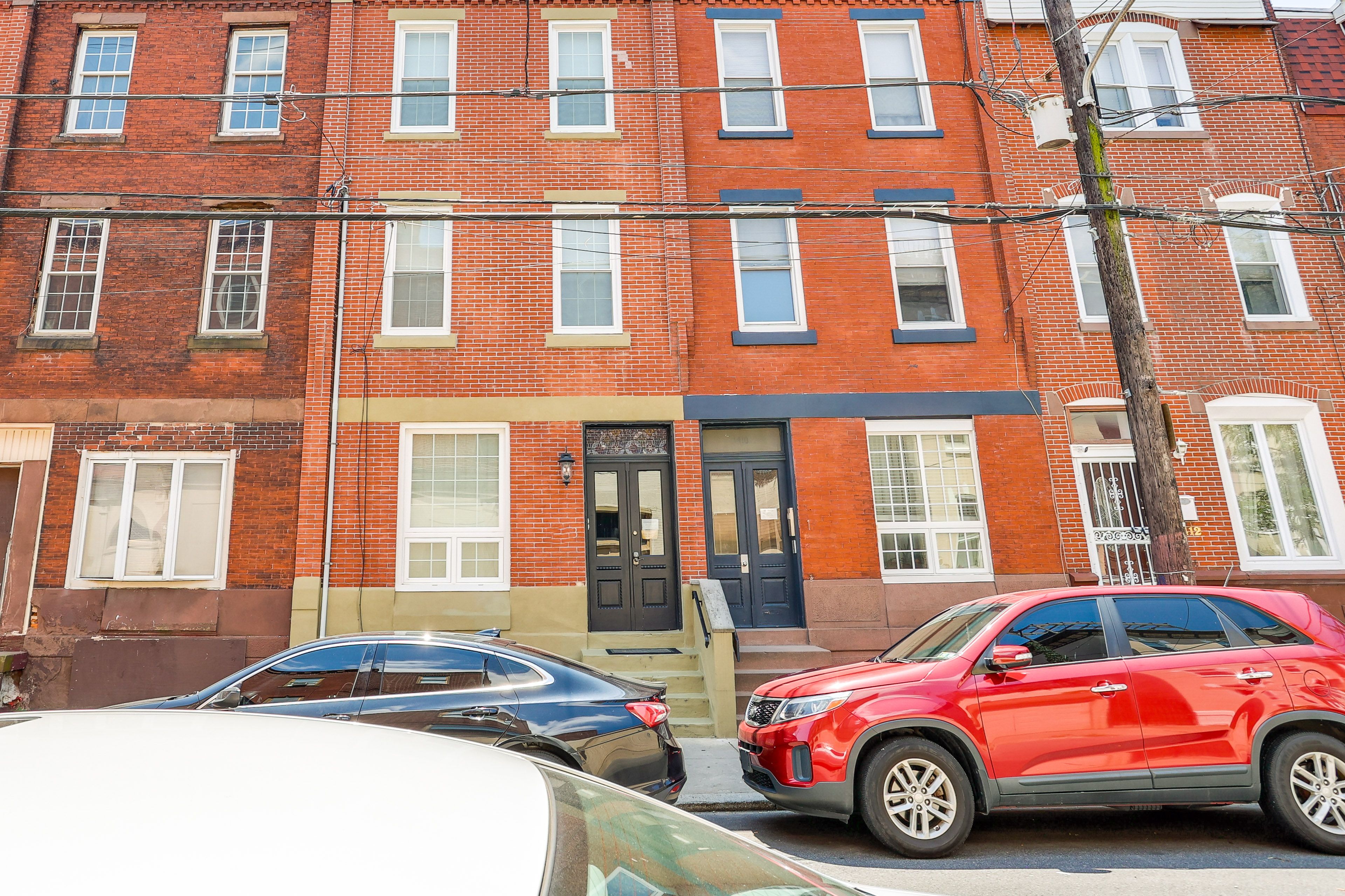 Townhome Exterior | Parking | Limited Public Parking (First-Come, First-Served)
