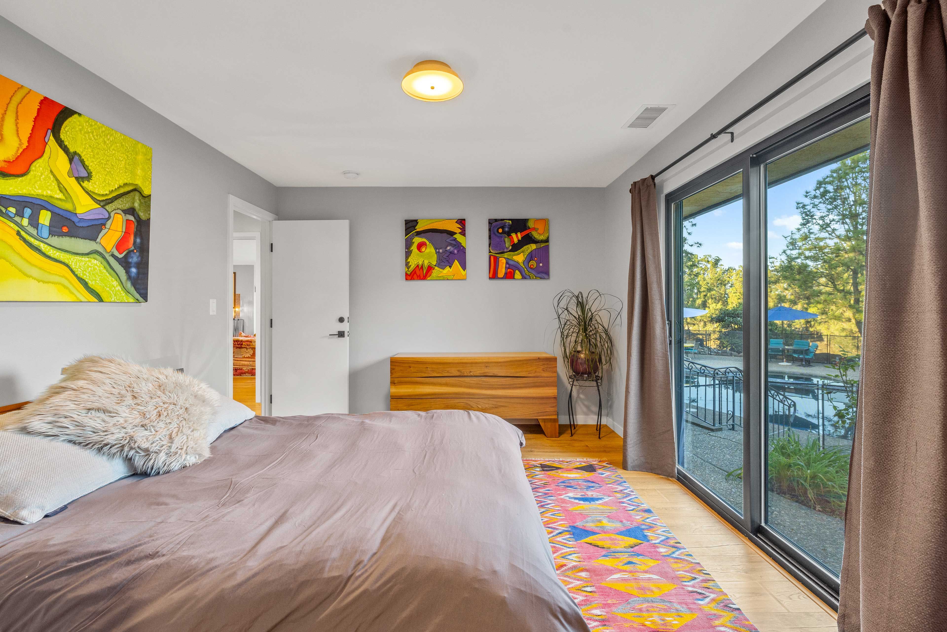 Bedroom 1 | Queen Bed | Smart TV | Access to Patio