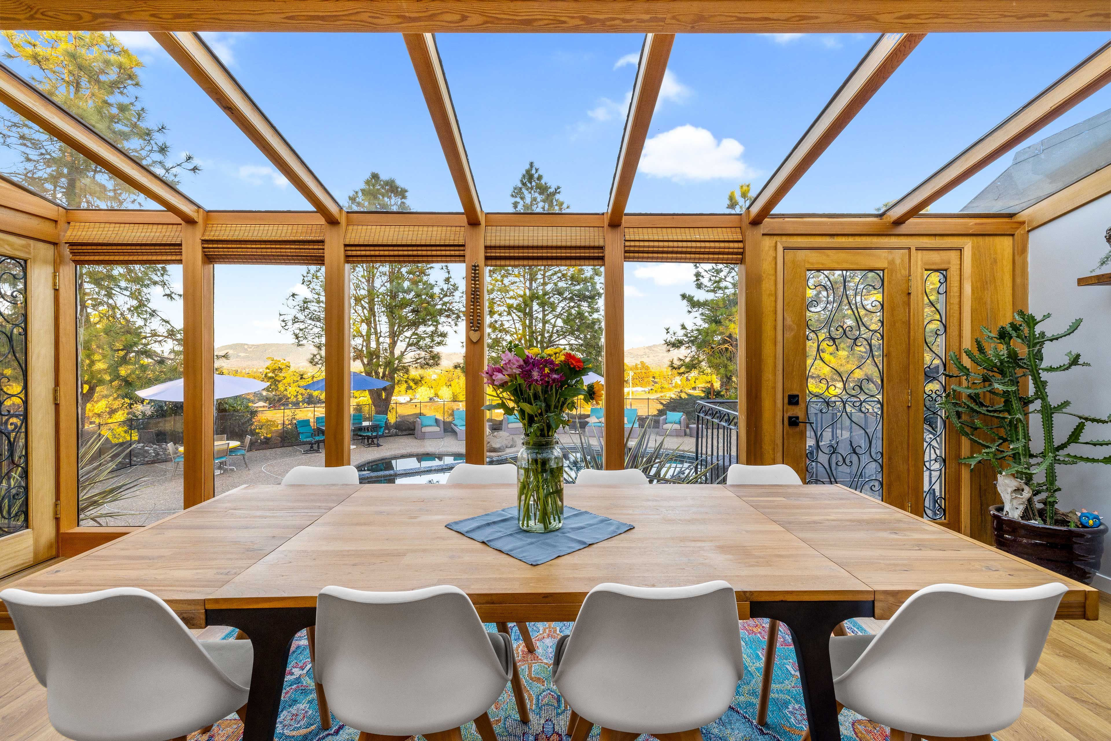 Solarium | Dining Area | Pool Views | Dishware/Flatware Provided