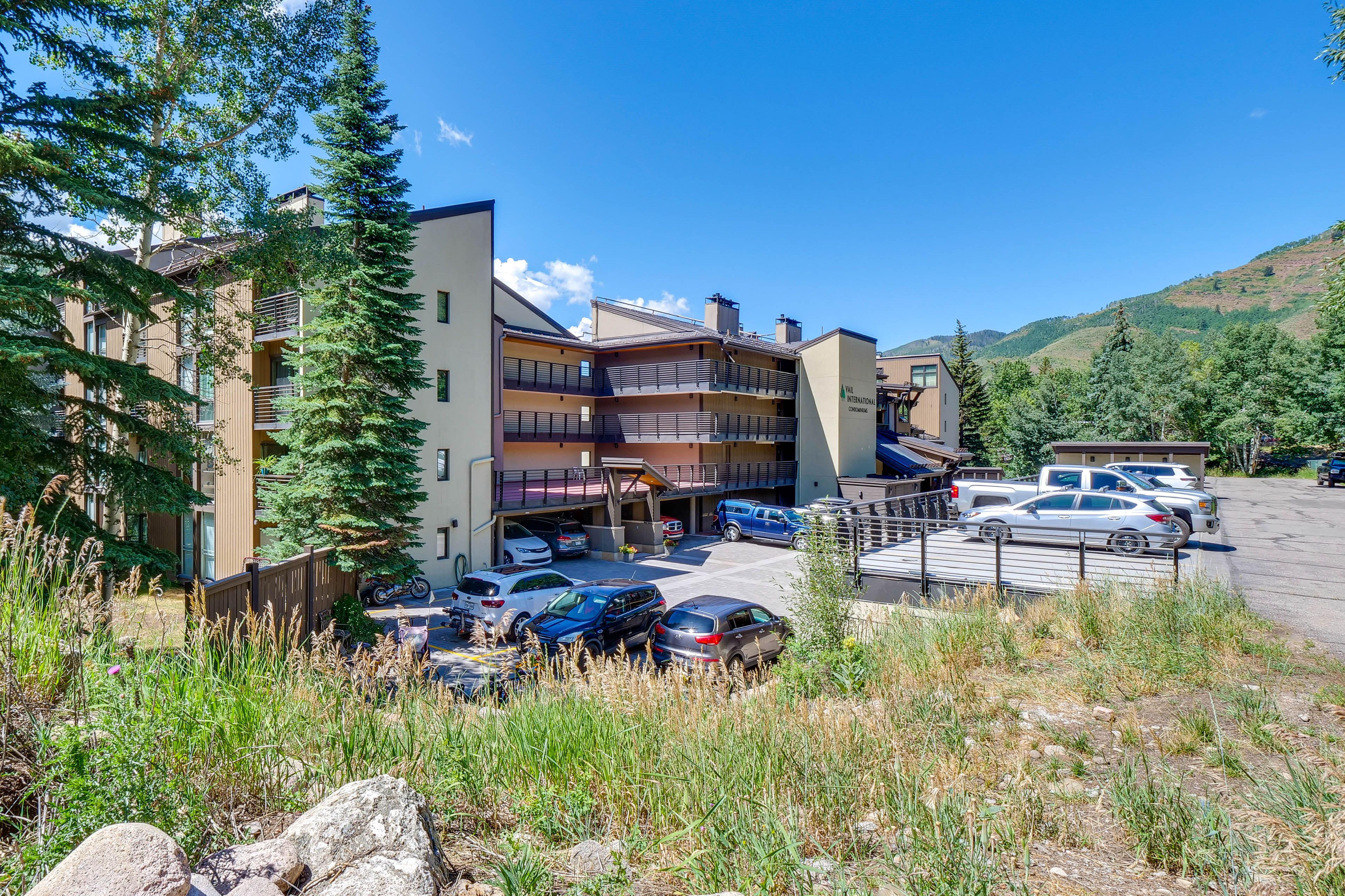 Condo Exterior | Elevator Access | Community Perks | Expansive Mountain Views