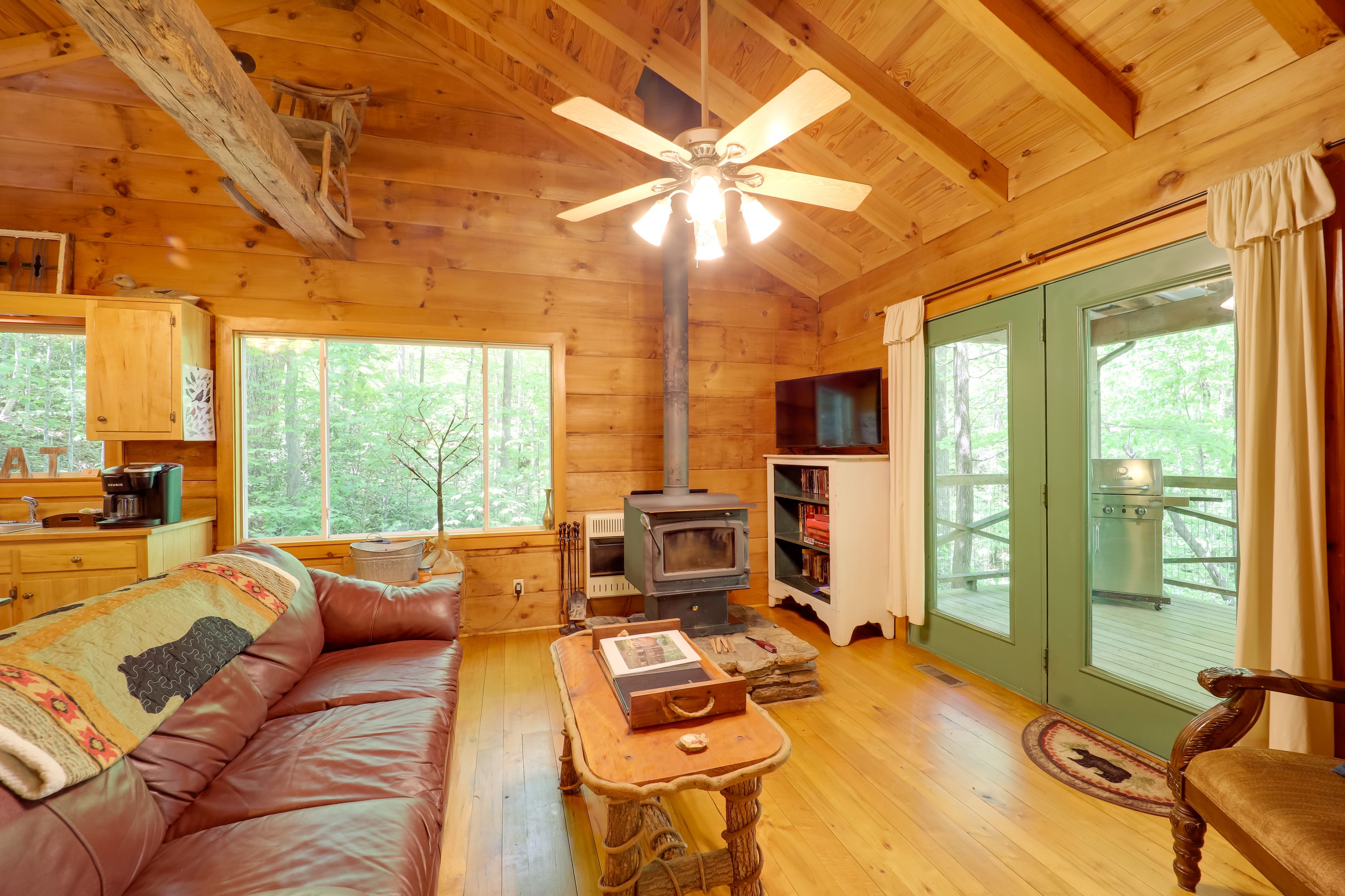 Living Room | Wood-Burning Stove | TV | Single-Story Cabin