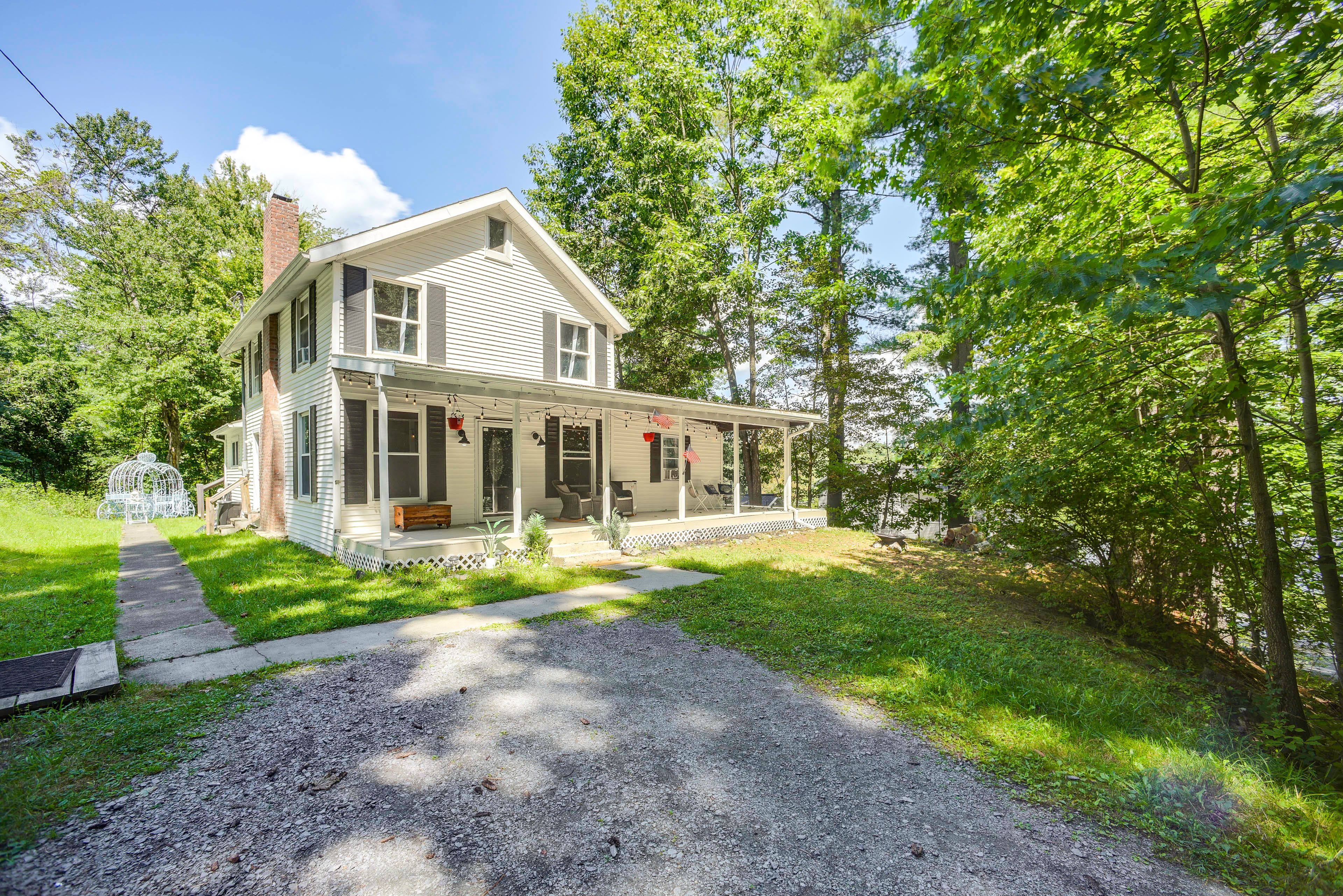 West Sand Lake Vacation Rental | 4BR | 2BA | 2,100 Sq Ft | Stairs Required