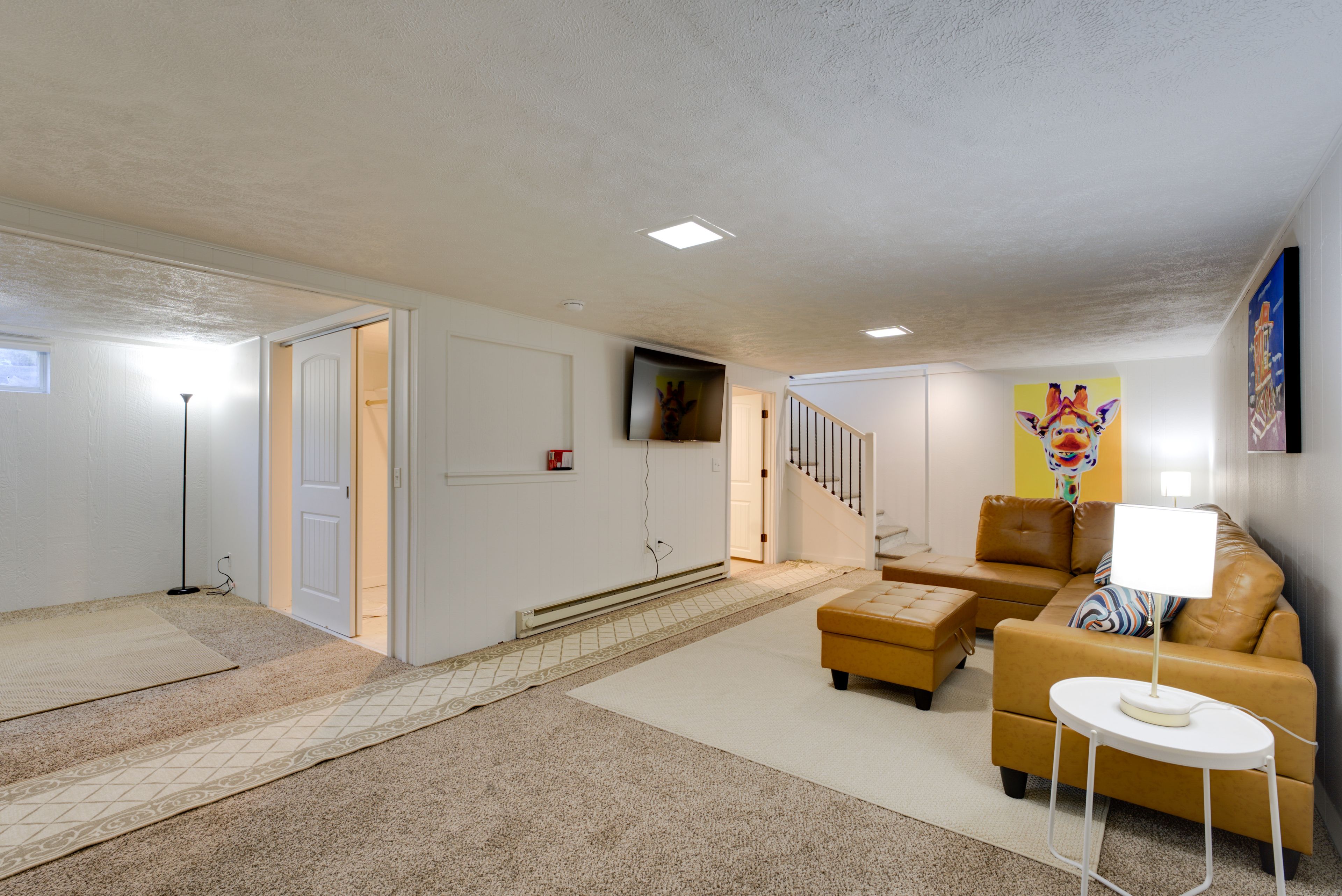 Lower Living Room | Smart TV | Electric Fireplace