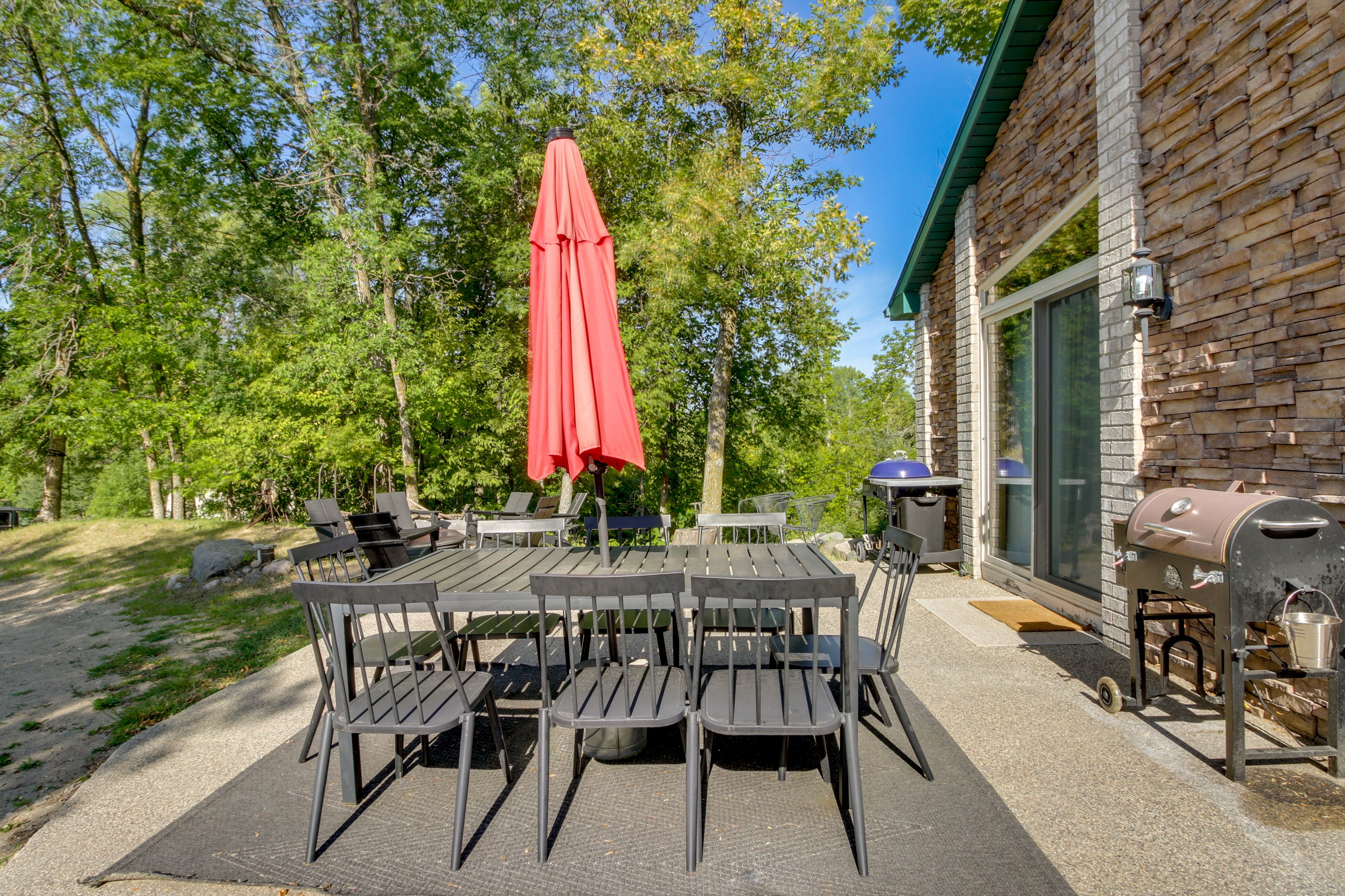 Cabin Exterior | Furnished Patio | Dining Area | Charcoal Grill & Smoker