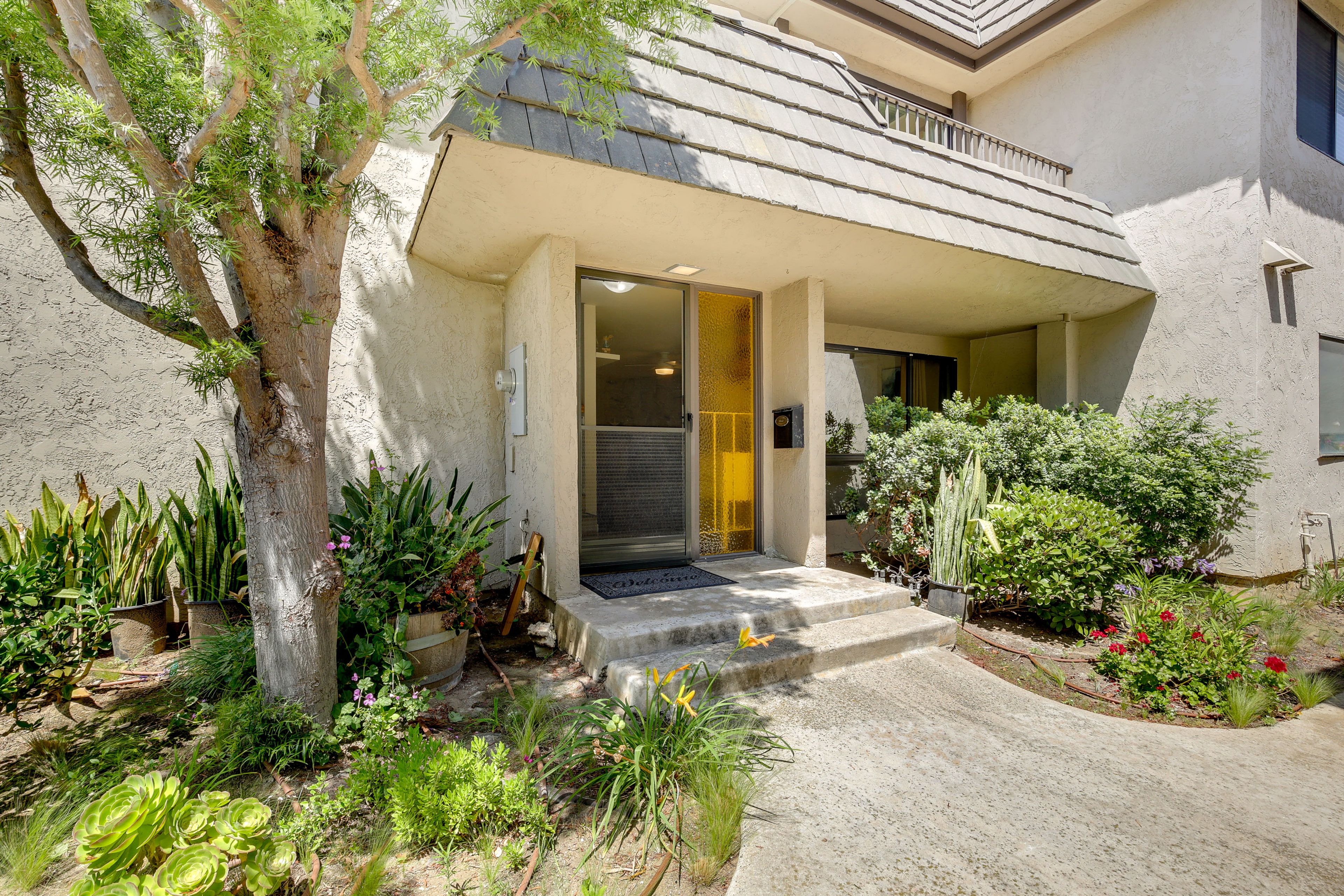 Property Exterior | Designated Garage Parking (2 Vehicles) | Free Street Parking