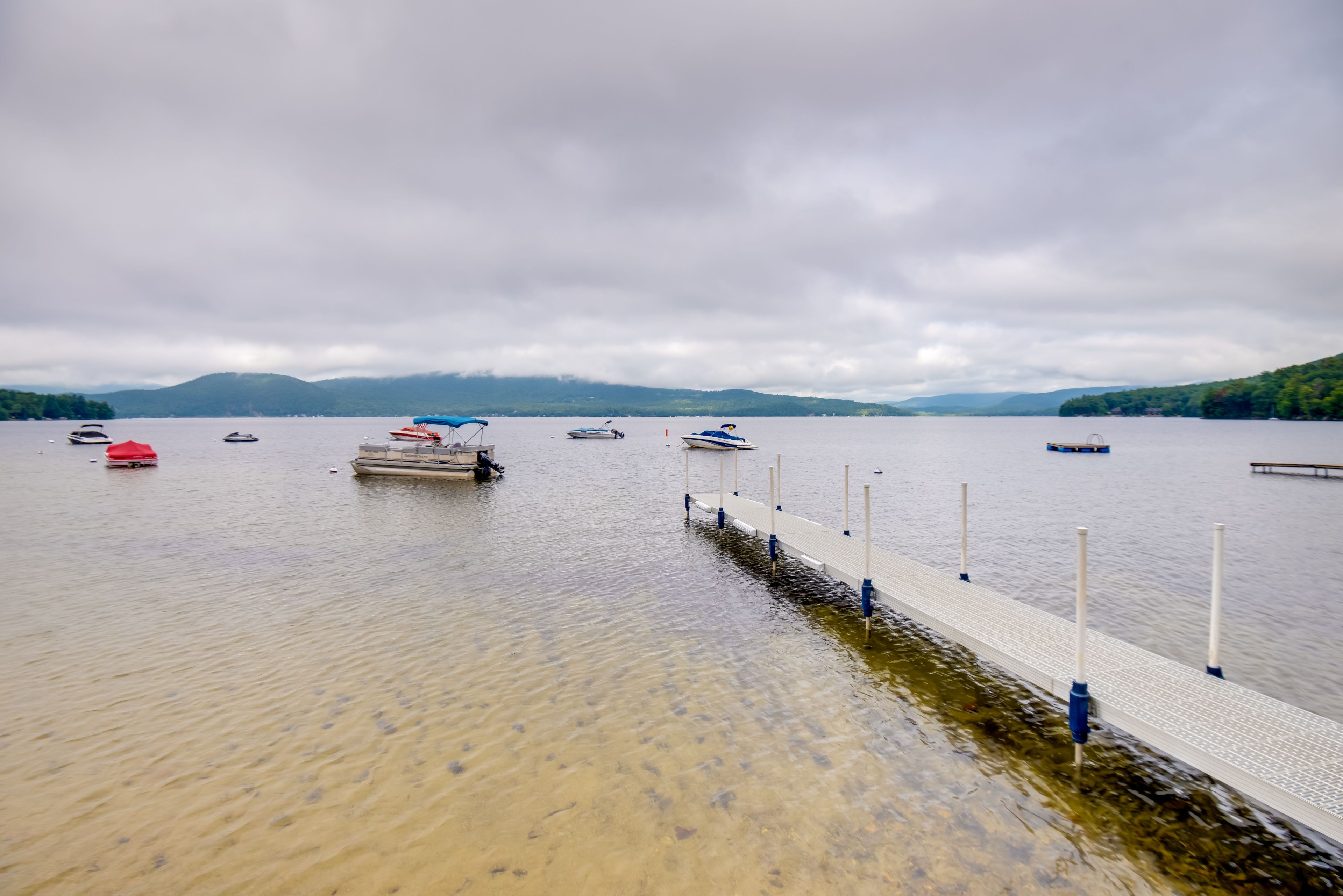 Condo Exterior | Shared Boat Dock & Launch | Lake Access