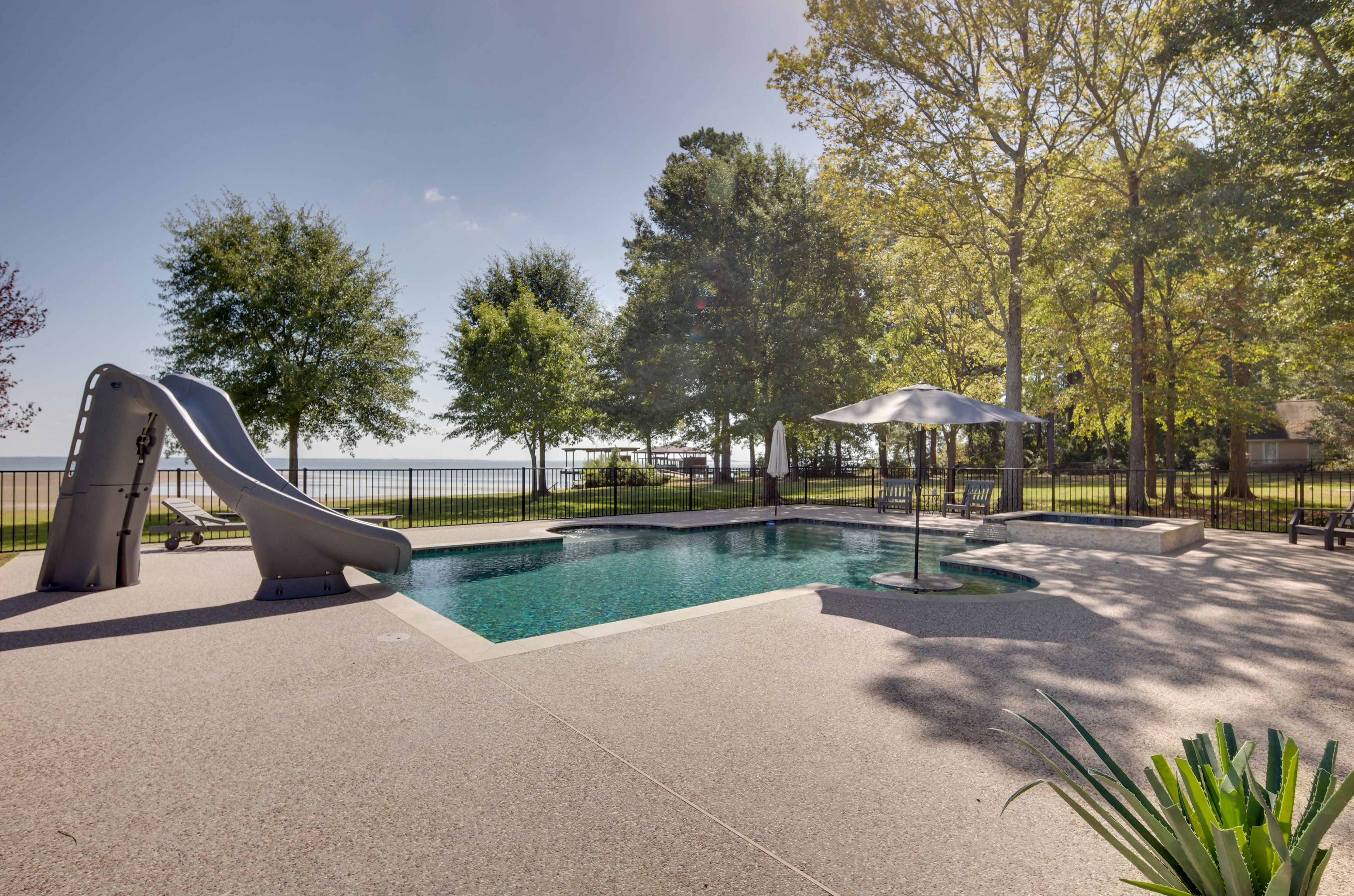 Patio | Outdoor Pool w/ Spa (Unheated) | Swing | Beach Towels