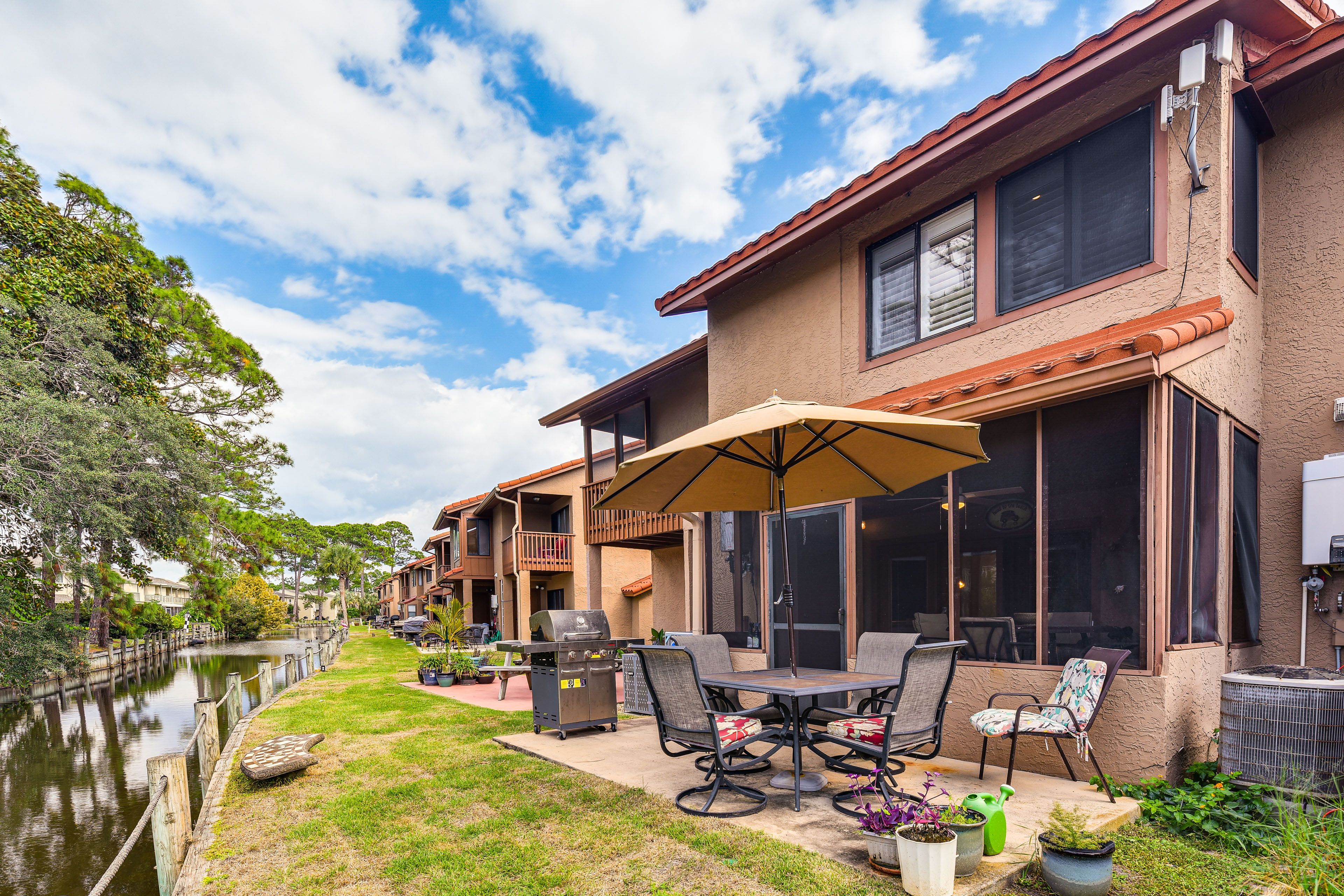 Backyard | Water Views | Outdoor Dining Areas | Screened-In Patio