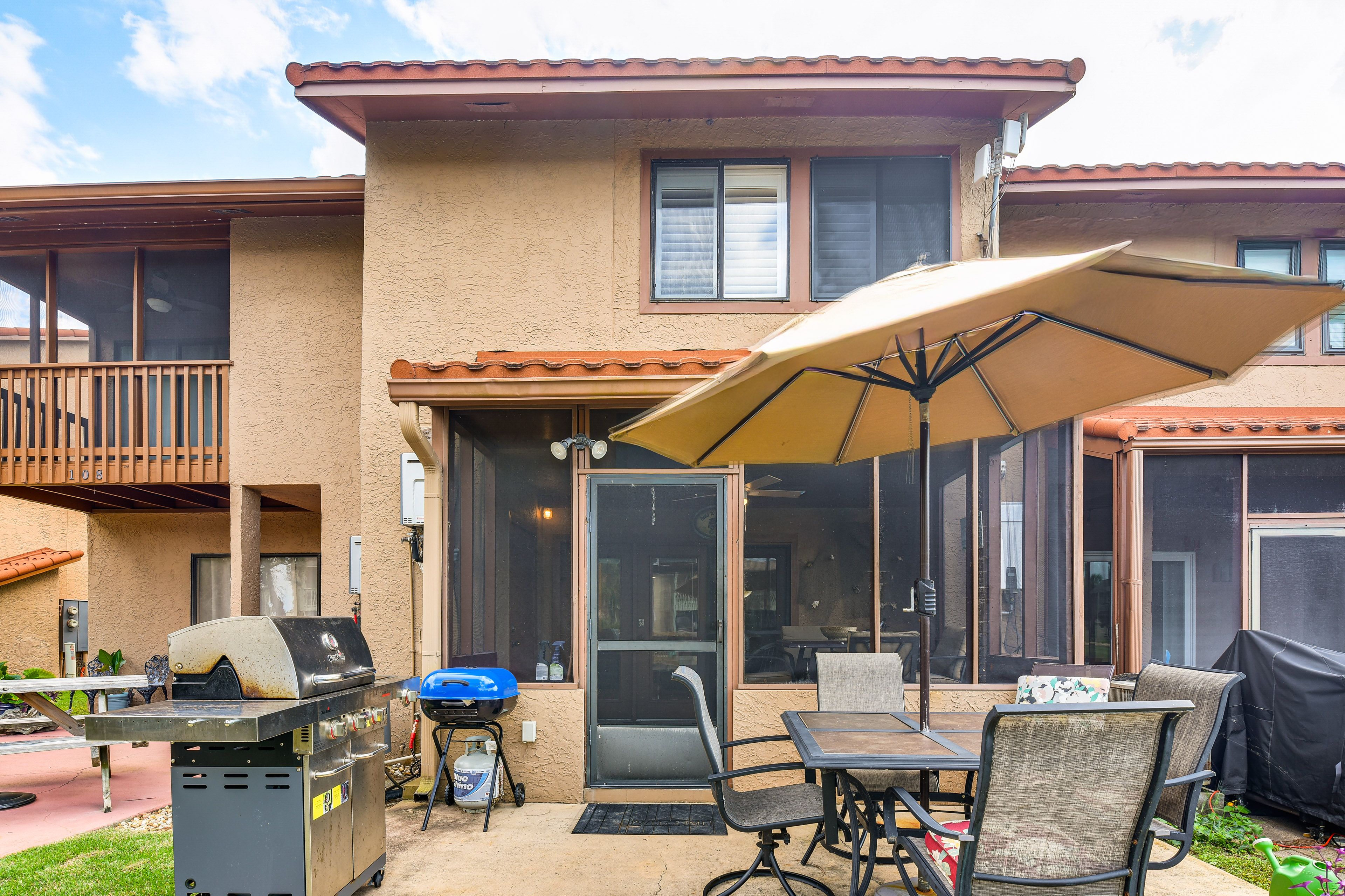 Back Patio | Cornhole | Charcoal Grill