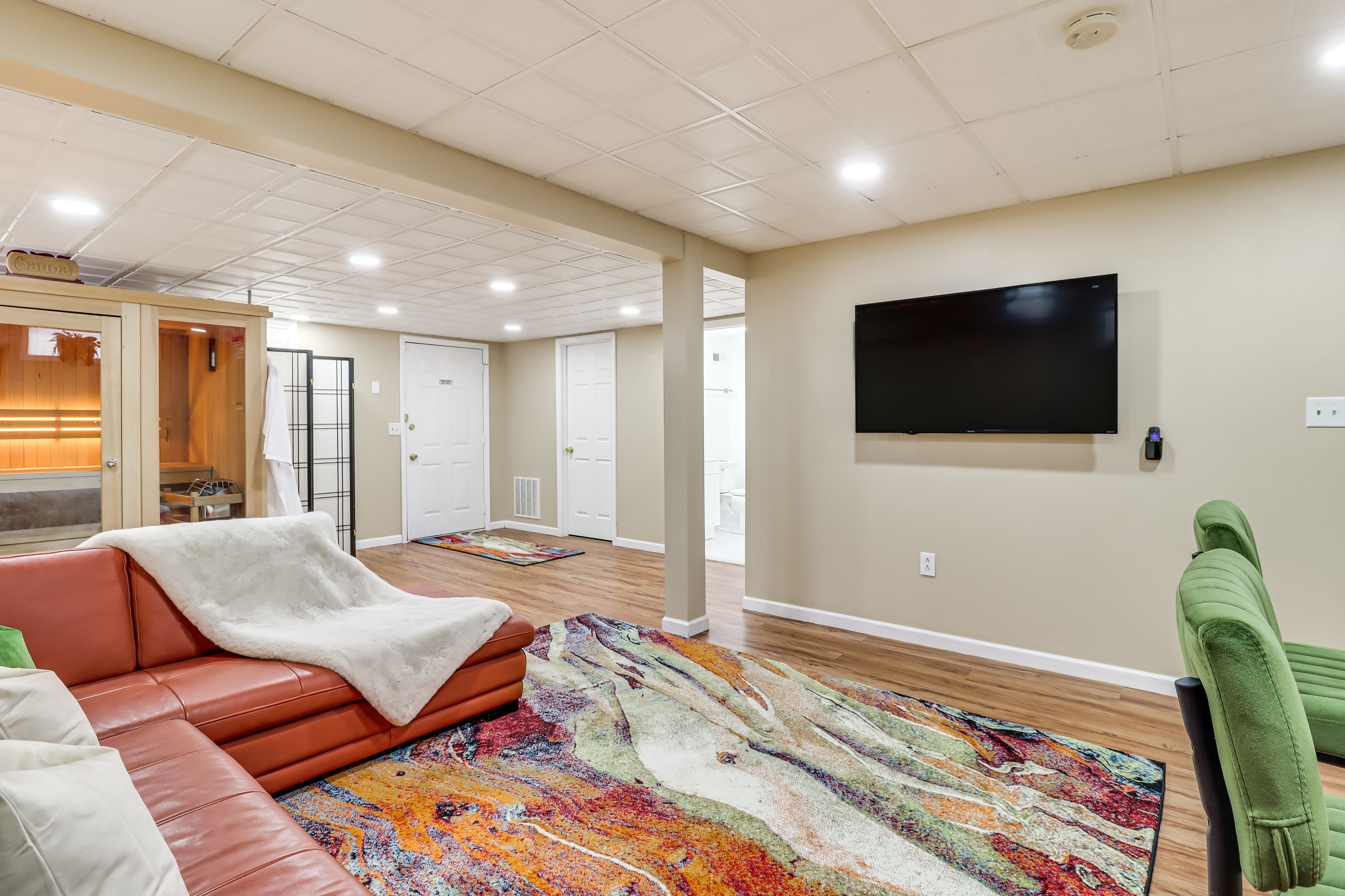 Basement Living Room | Flat-Screen TV | Wet Bar | Sauna | Basement Level