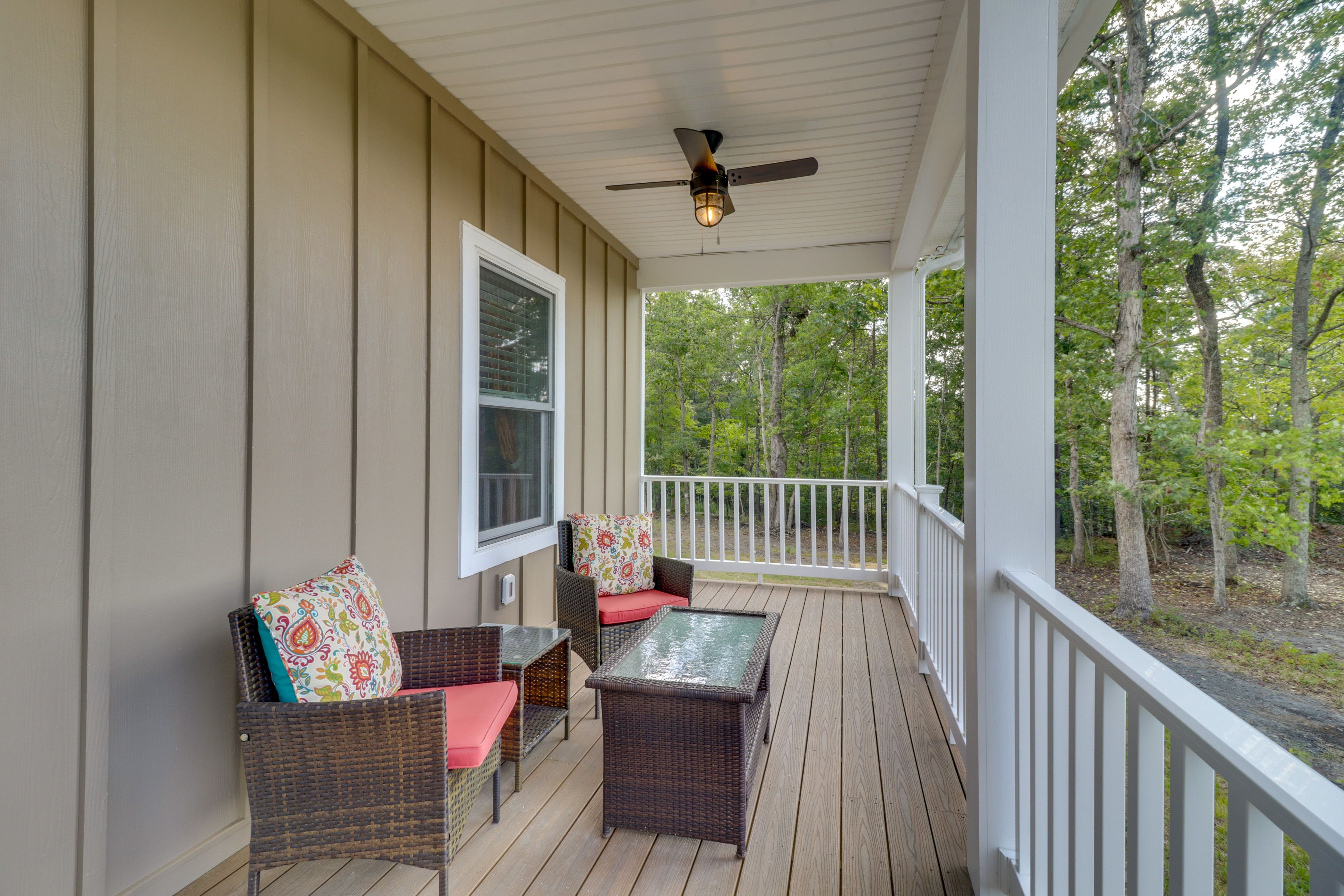 Covered Porch | Seating | Forested Views