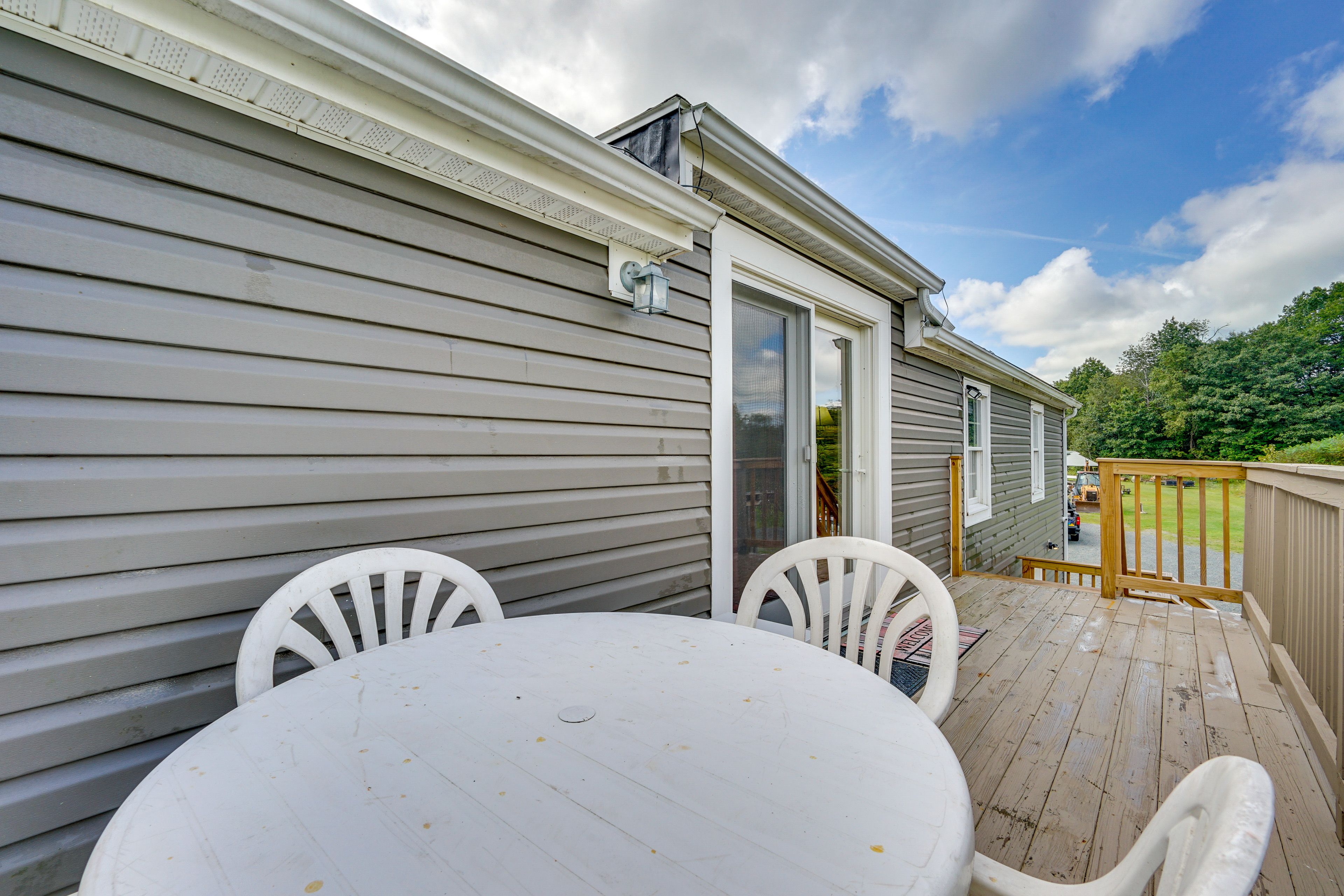 House Exterior | Furnished Deck | Dining Area