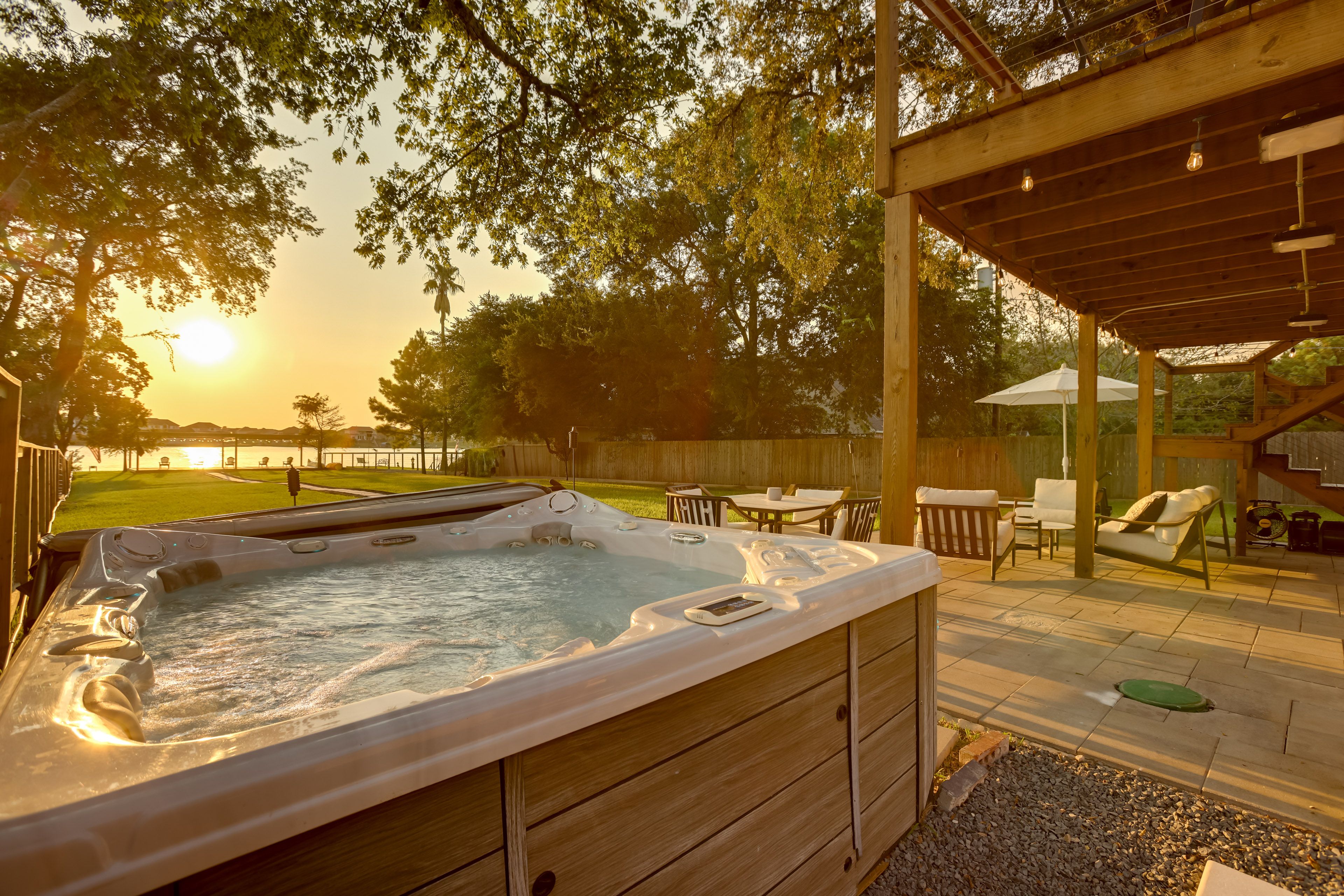 Home Exterior | Hot Tub | Furnished Patio | Lake Conroe Access