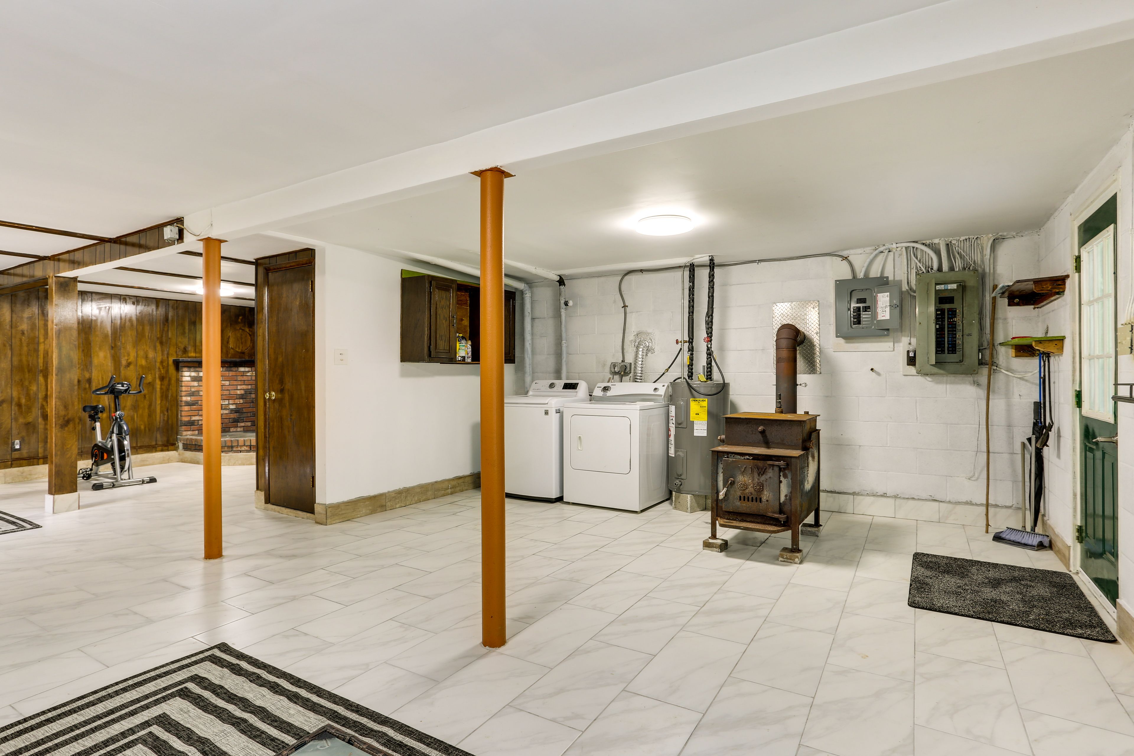 Lower Level | Laundry Machines | Laundry Detergent | Decorative Gas Stove