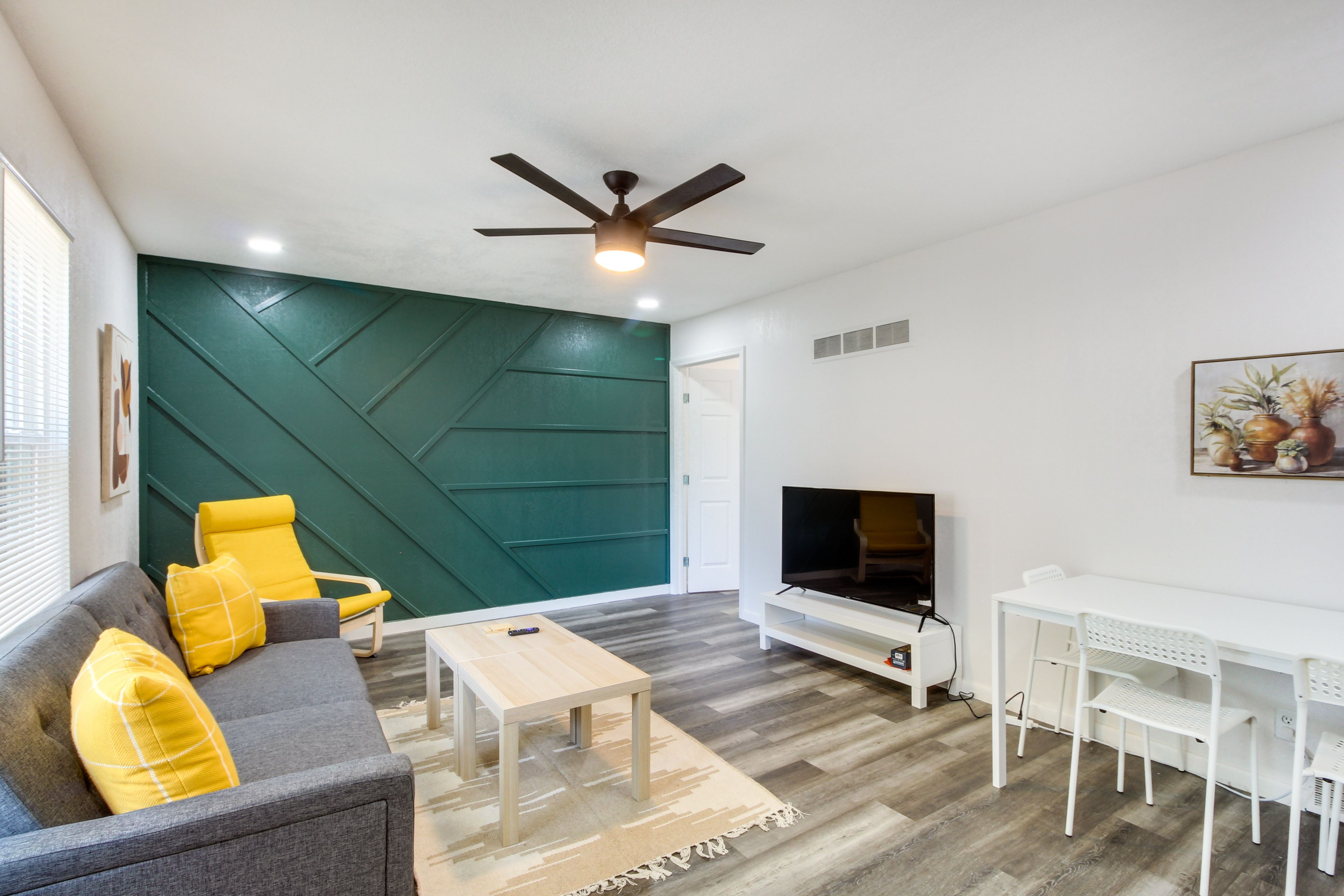 Overland Park Vacation Rental | 2BR | 2BA | 1 Tall Step to Access | 950 Sq Ft