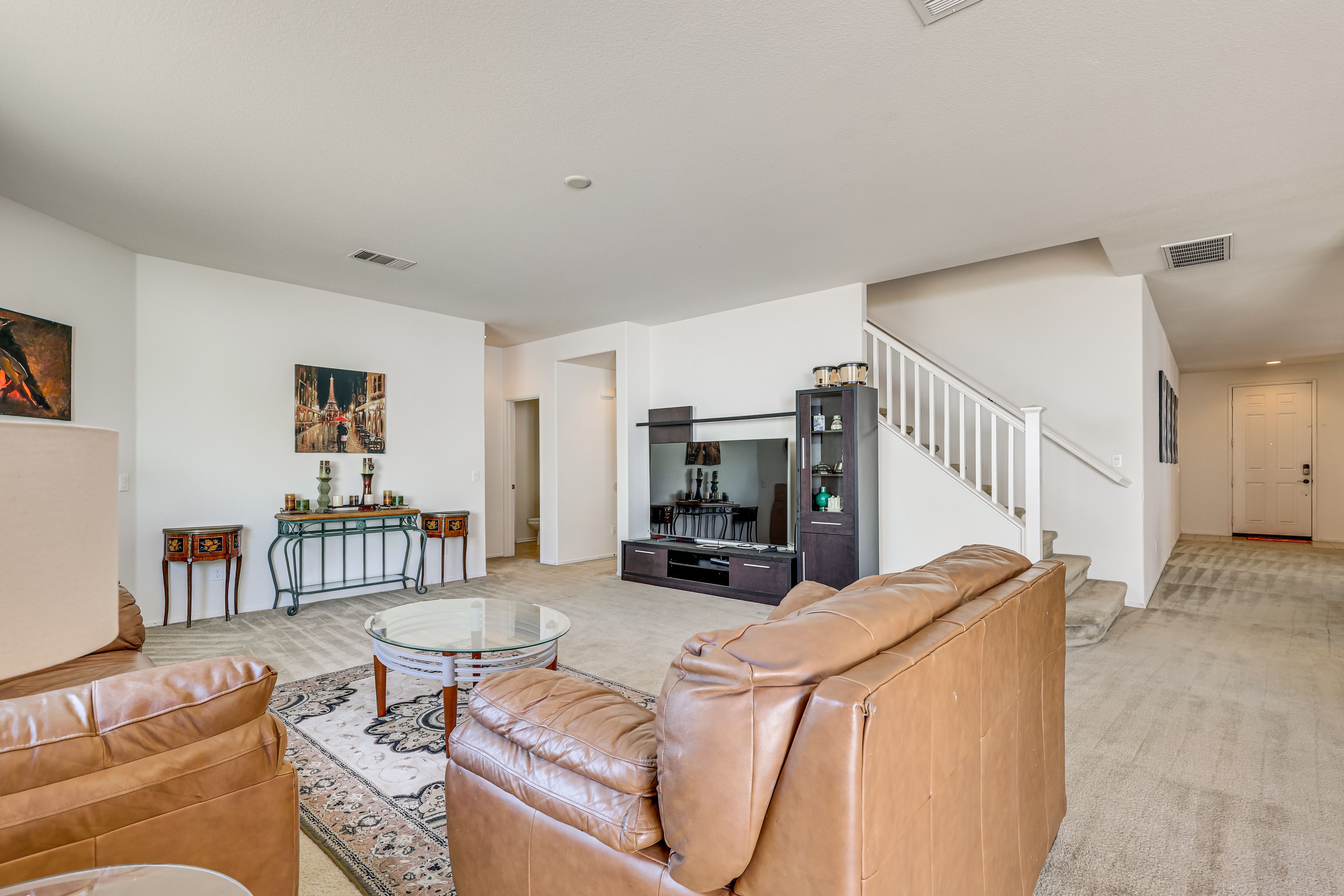 Living Room | 1st Floor | 75" TV | Gas Fireplace | Central A/C + Heating