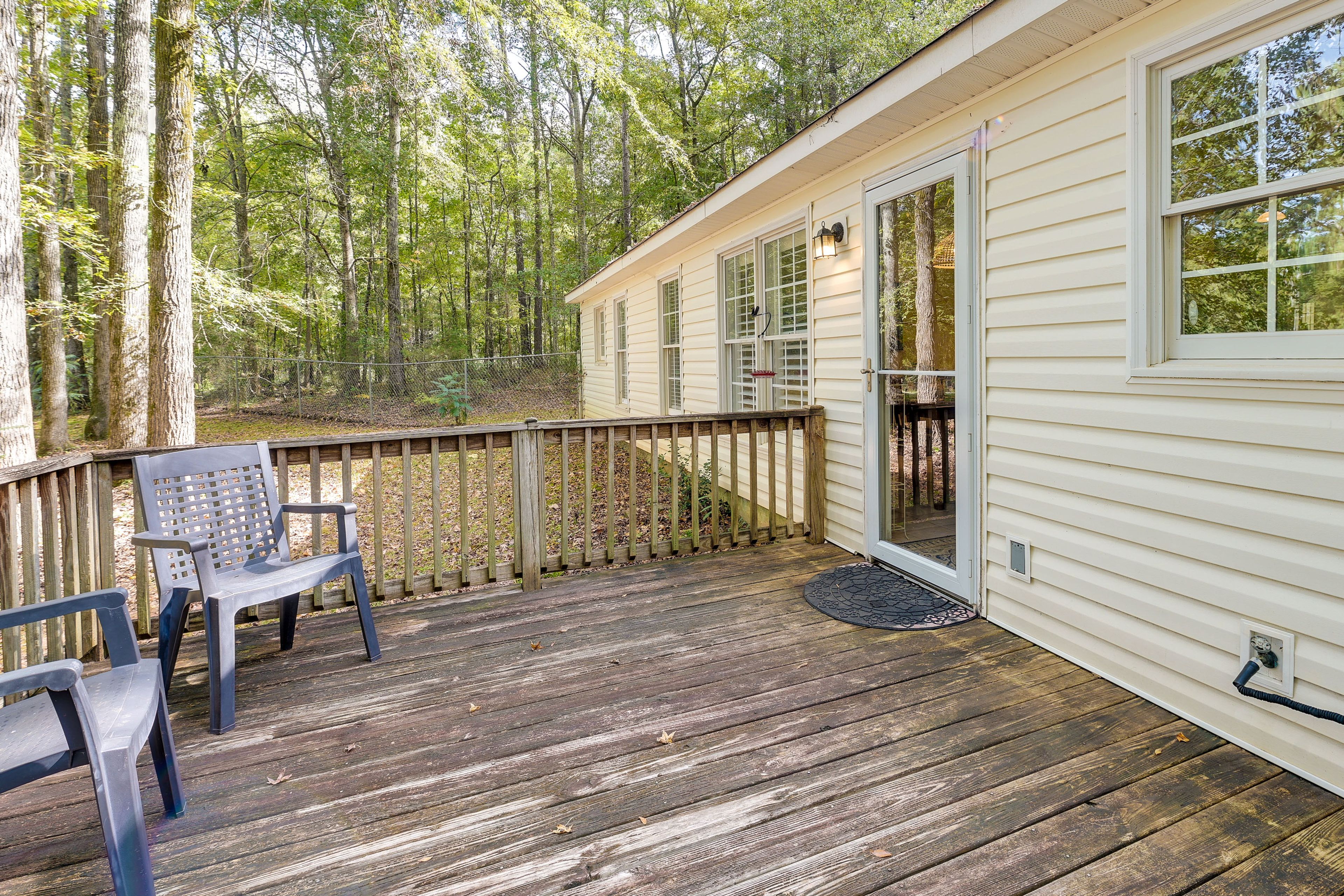 House Exterior | Furnished Deck | Charcoal Grill (Bring Your Own Charcoal)