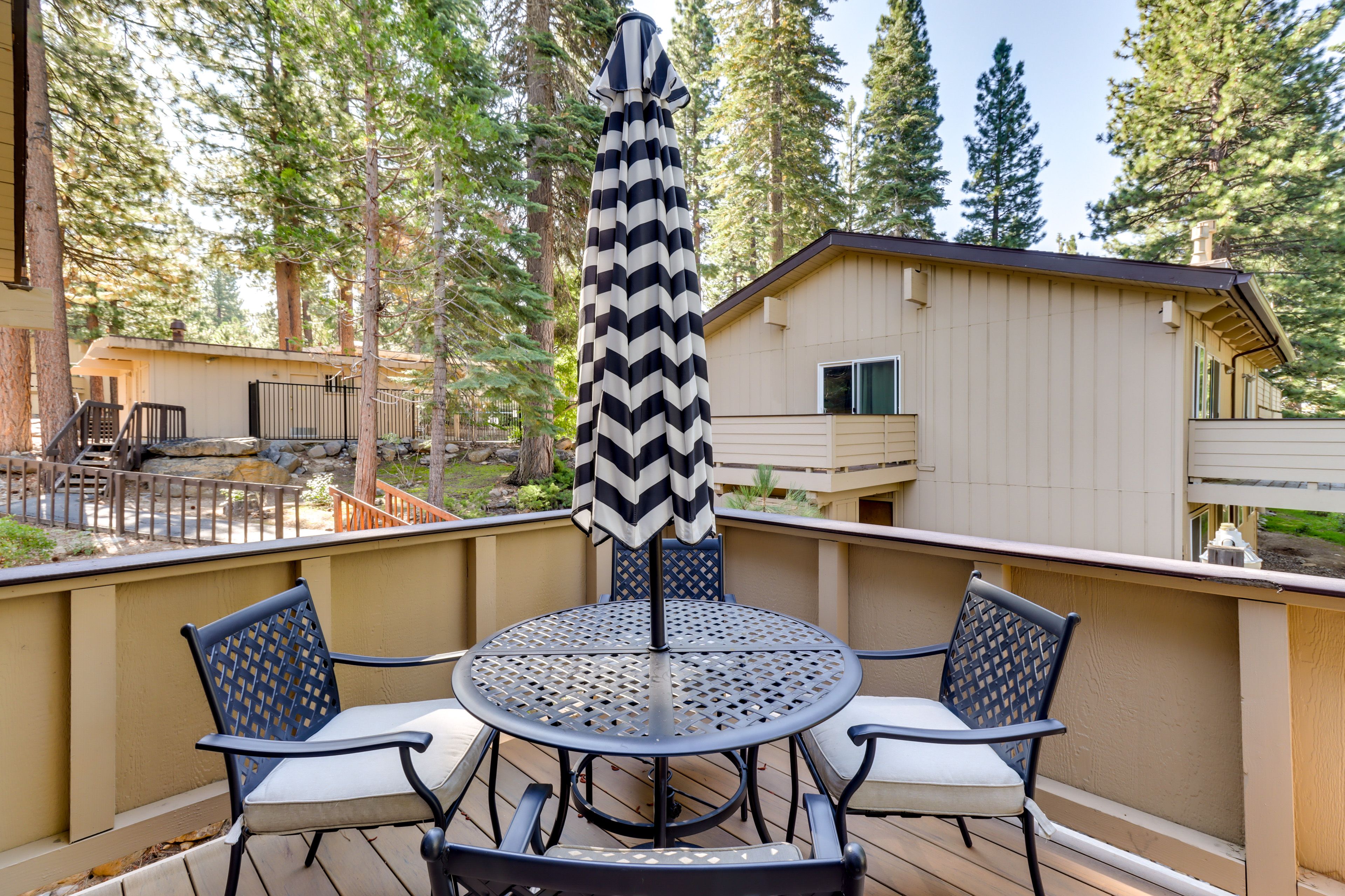 Townhome Exterior | Furnished Wraparound Deck | Dining Area | Gas Grill