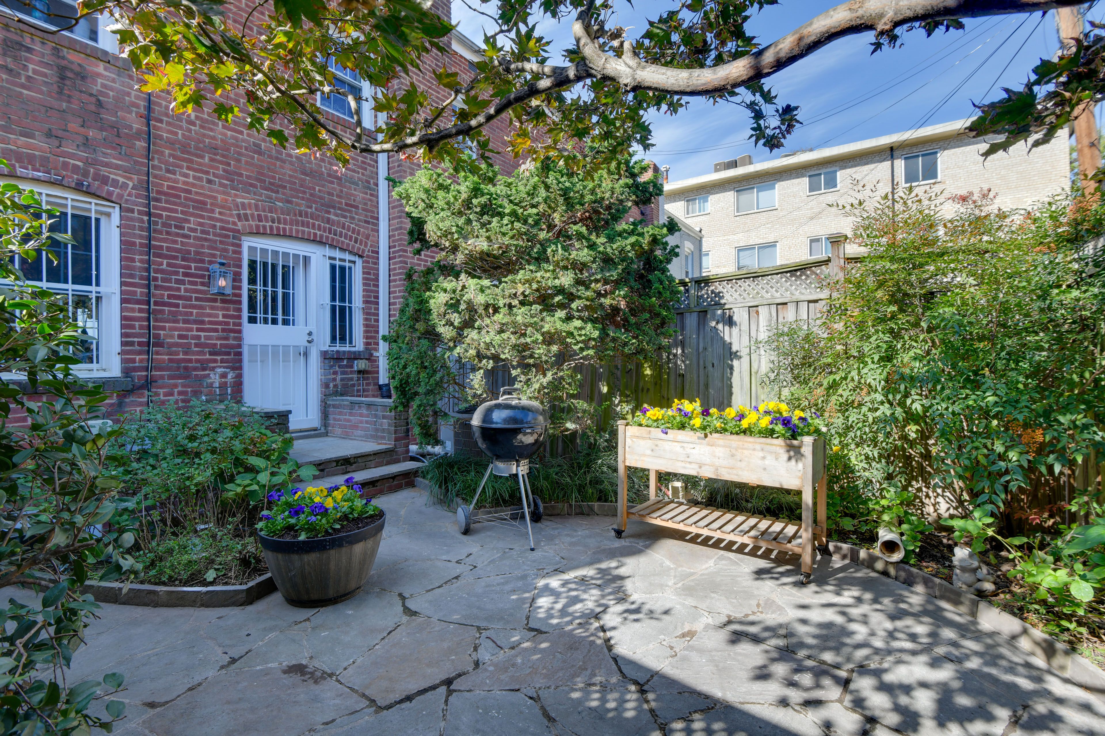 Exterior | Homeowner On-Site (Separate Unit) | Shared Yard & Charcoal Grill
