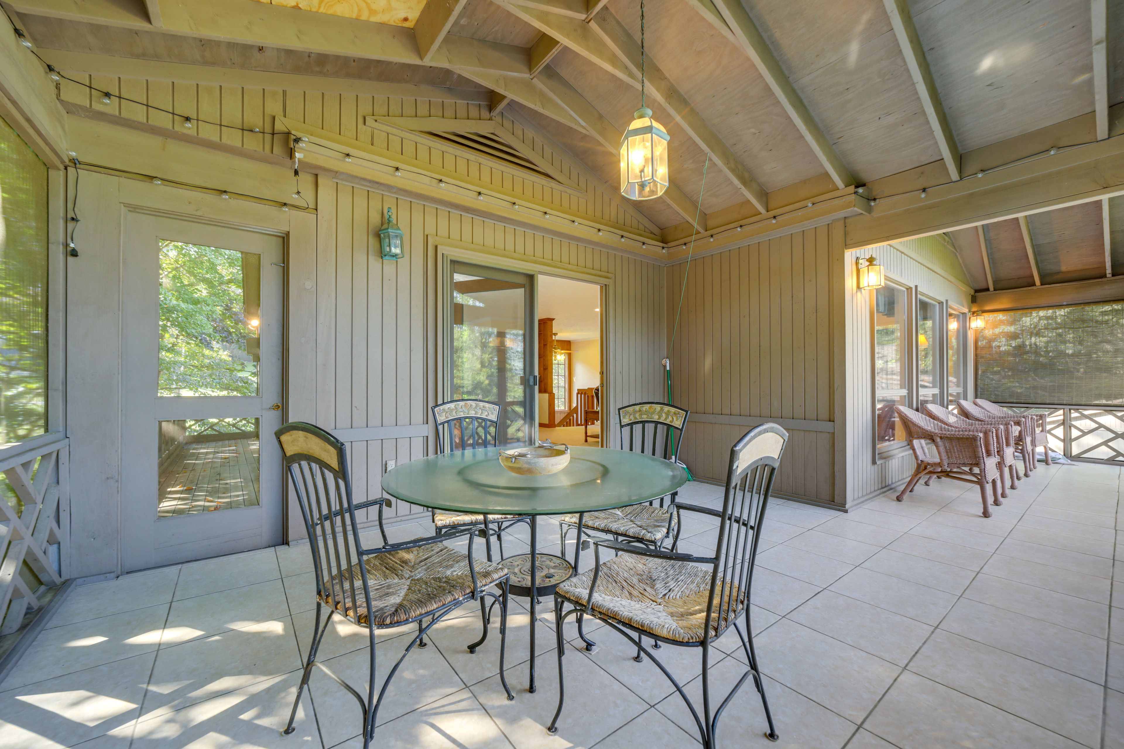 Screened-In Porch | Outdoor Seating & Dining | Outdoor String Lights