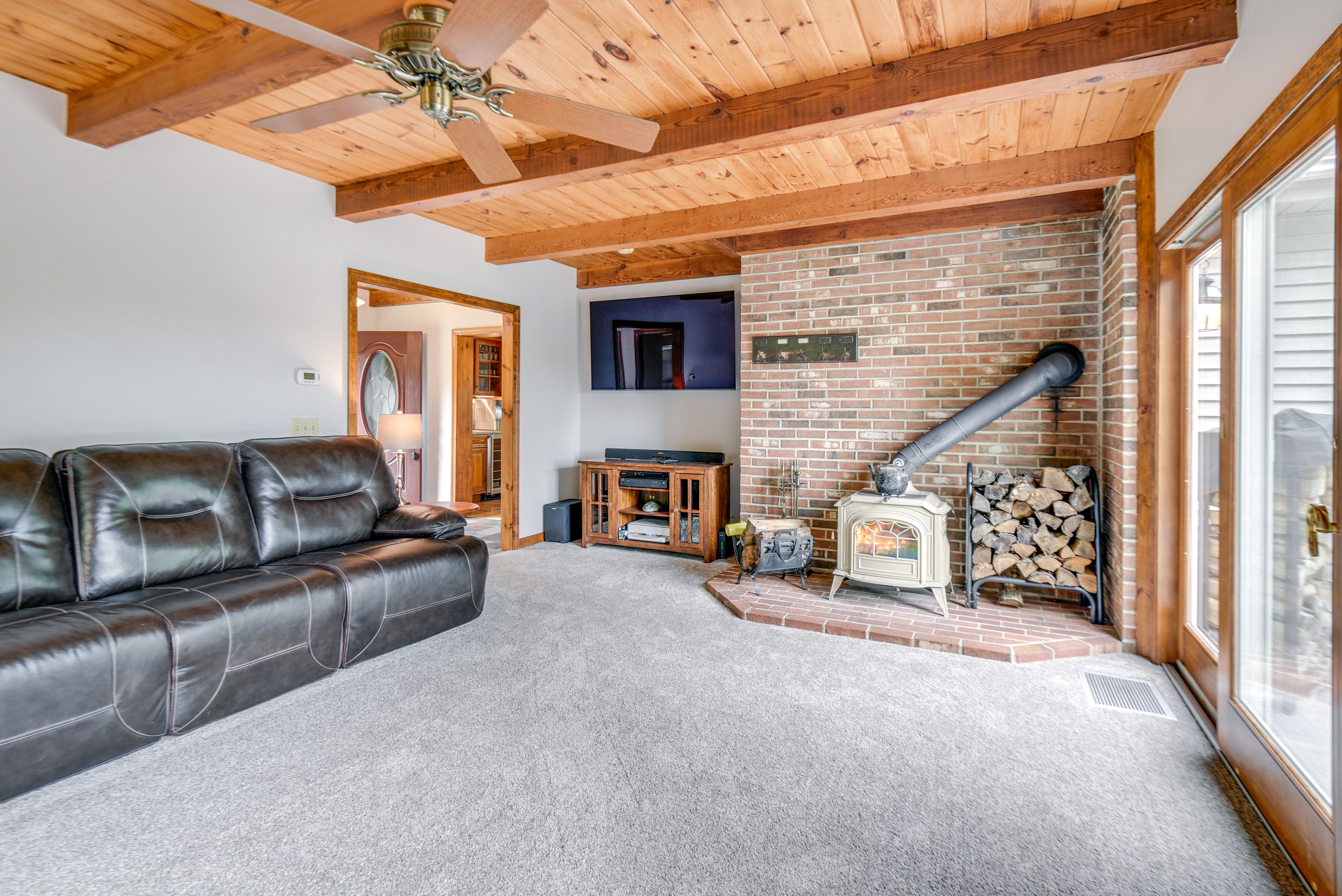 Living Room | Smart TV | Recliner Sofa | Wood-Burning Stove | Keyless Entry