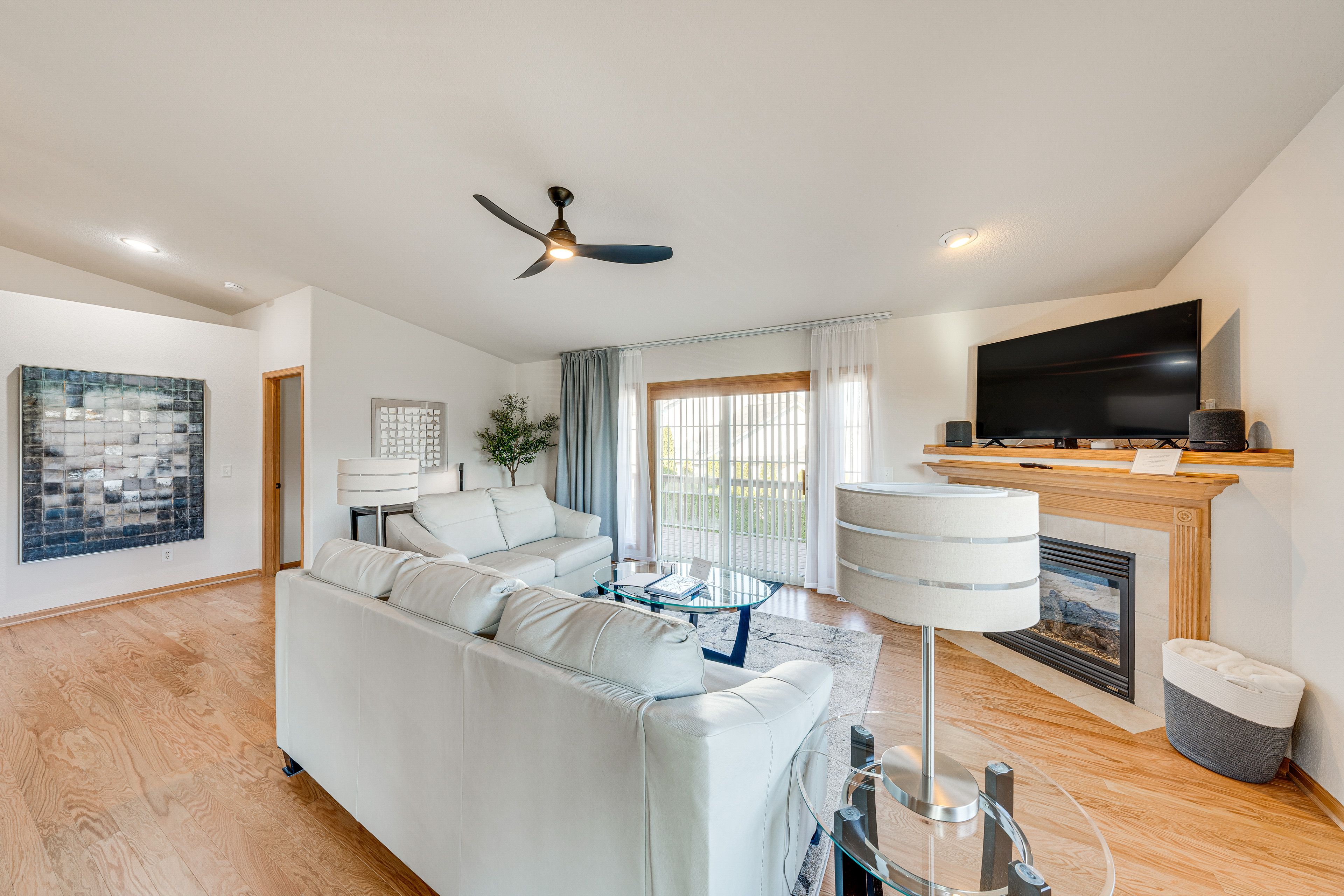 Living Room | Smart TV | Full Futon | Queen Air Mattress | Pack 'n Play