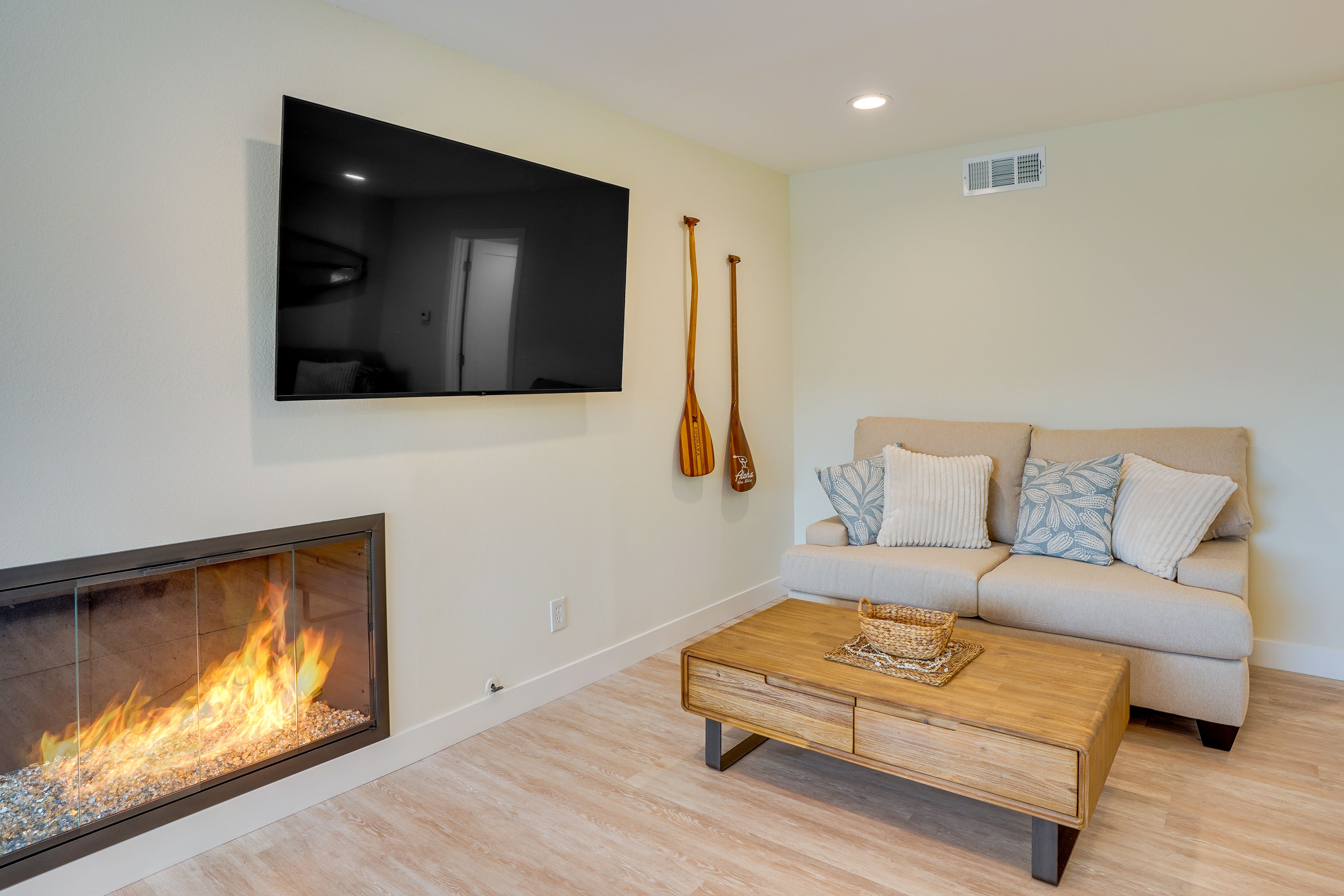 Living Room | Smart TV | Electric Fireplace | Queen Murphy Bed