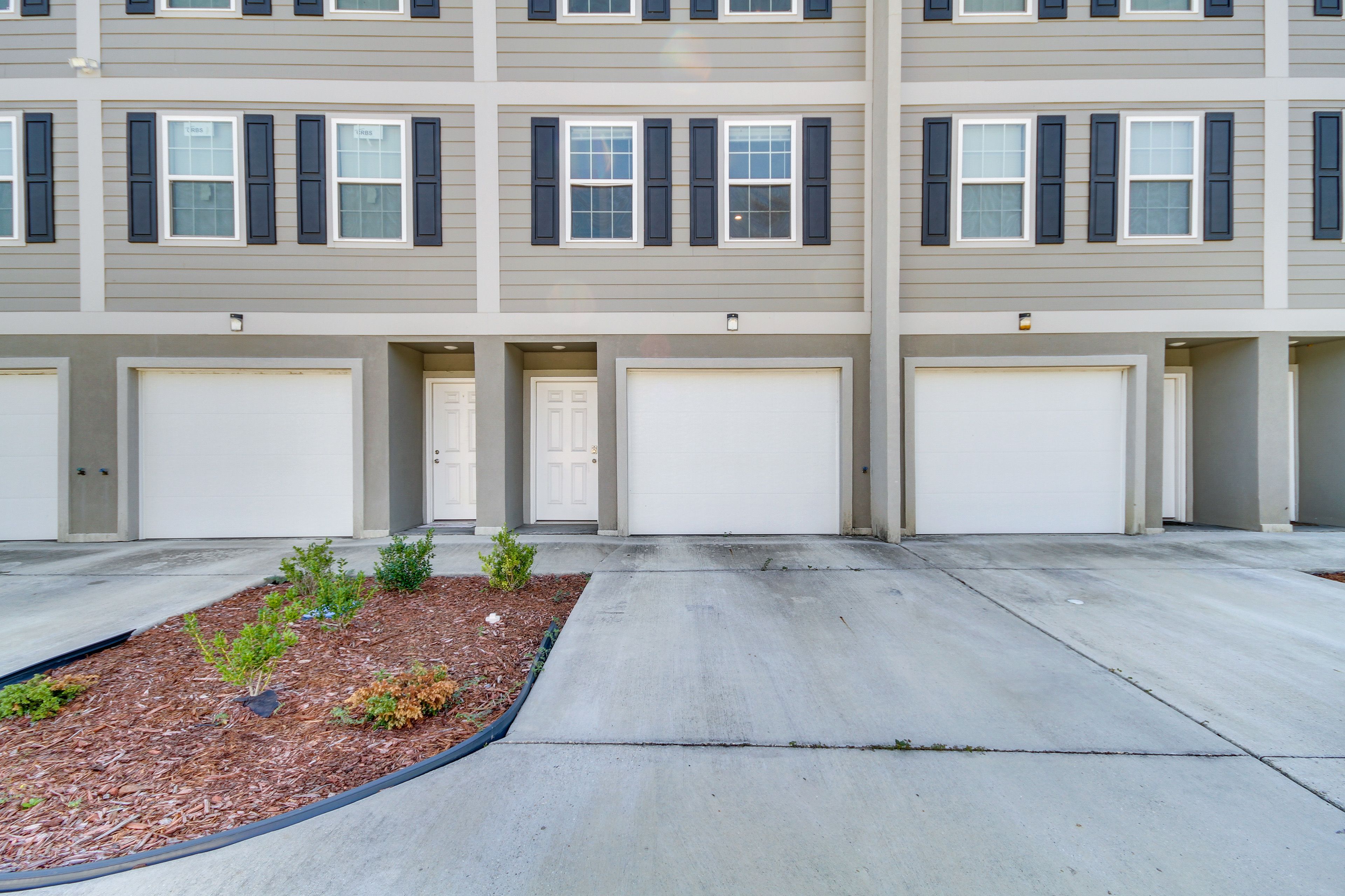 Townhome Exterior | Parking | Garage (1 Vehicle) | Driveway (1 Vehicle)