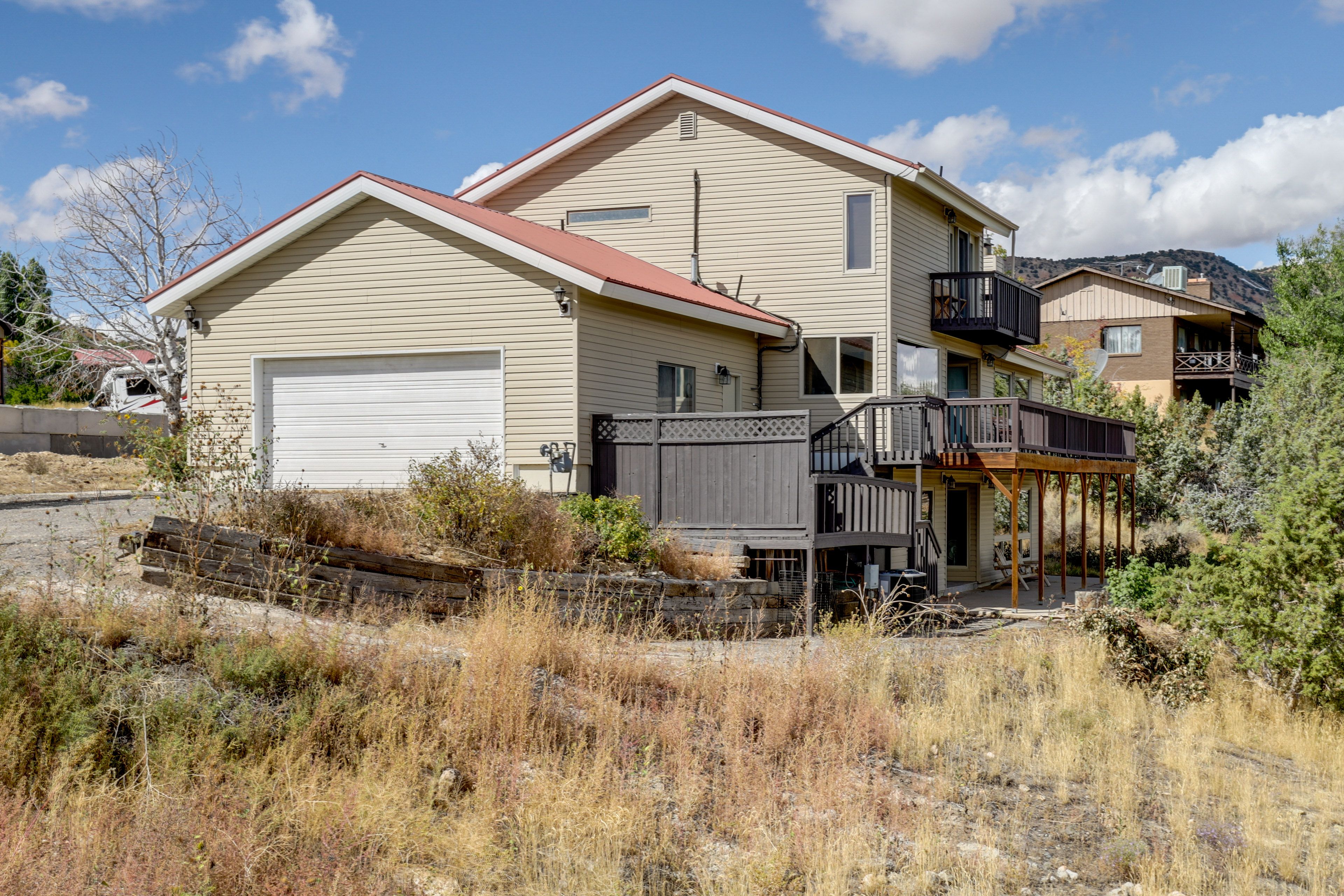 Surrounding Area | Shared Garage (1 Vehicle) | Driveway (1 Vehicle)