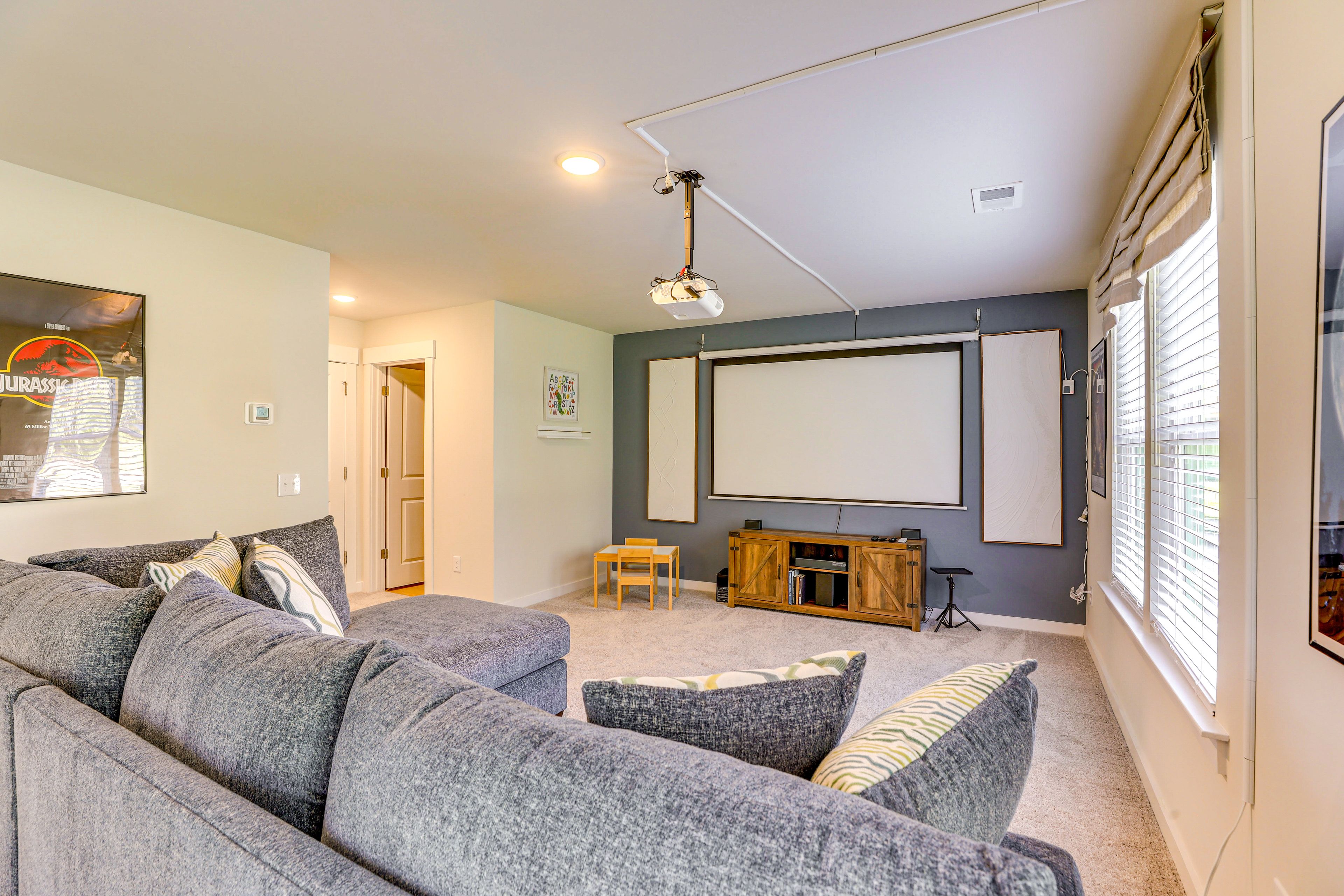 Den | Projector Screen | 3-Story Townhome | In-Unit Laundry