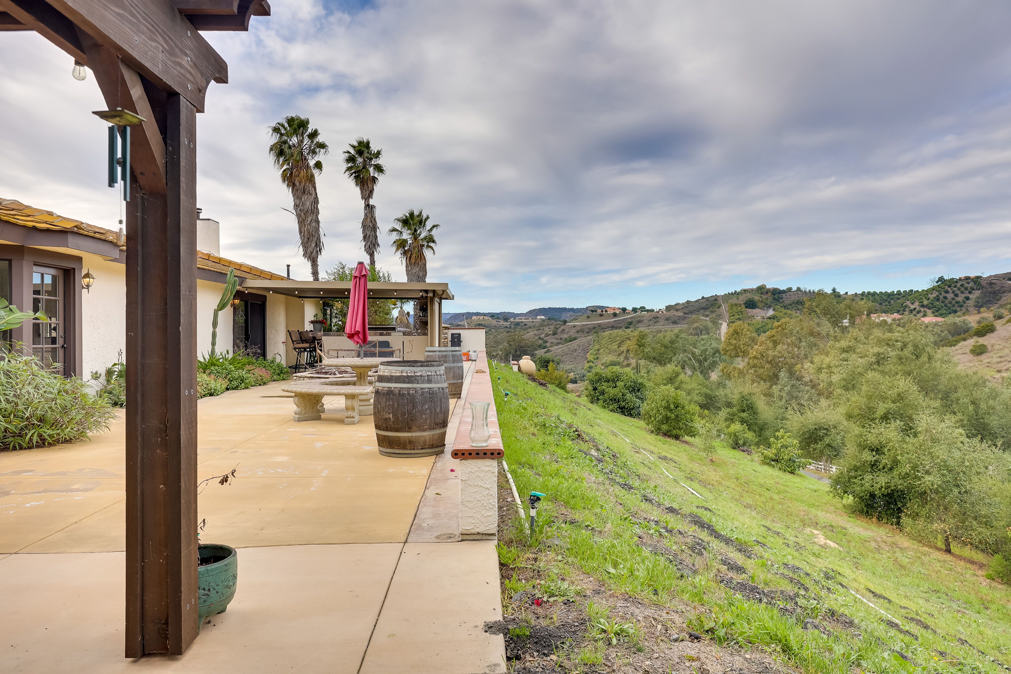 House Exterior | Furnished Patio | Dining Area | Gas & Charcoal Grills | Smoker
