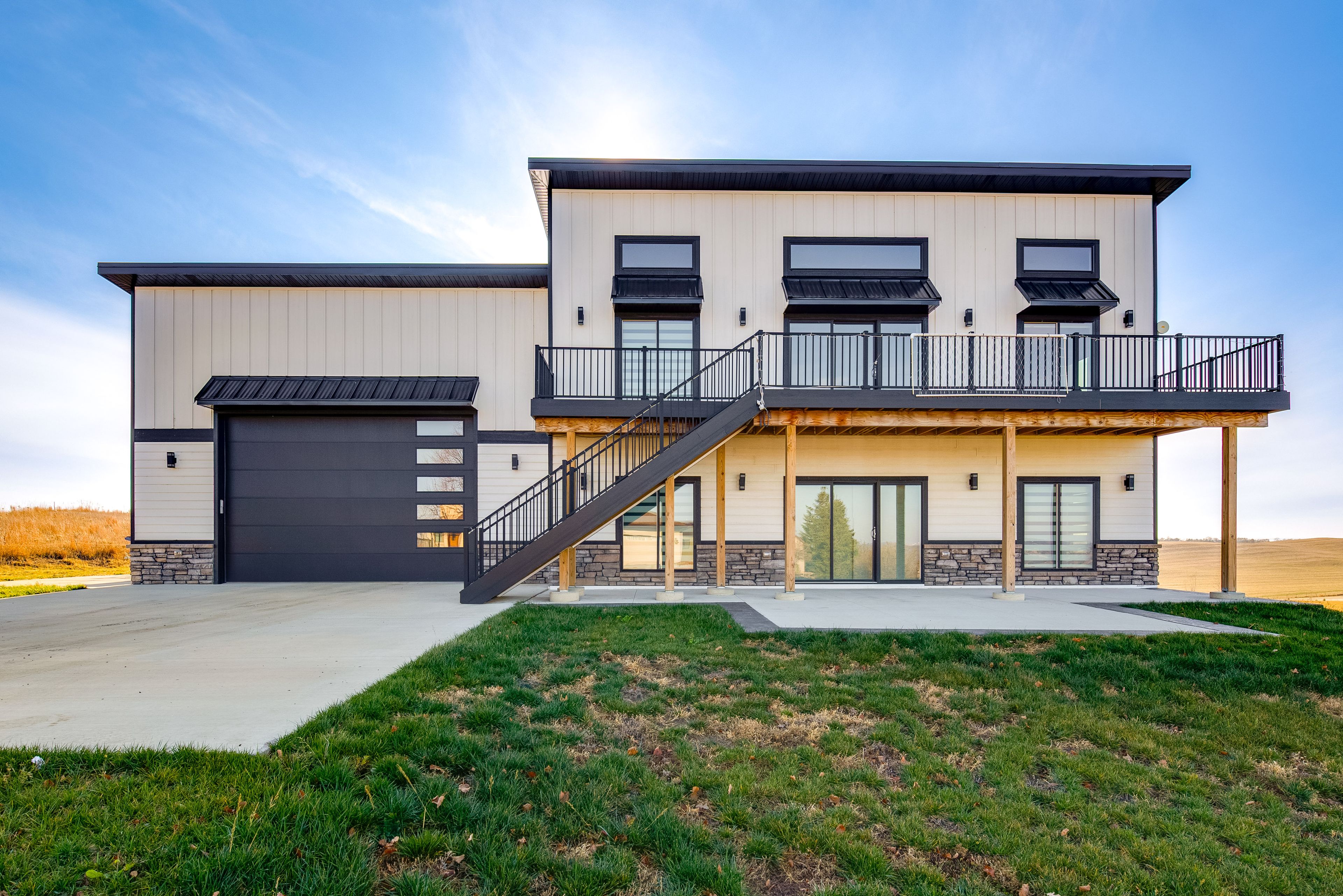 Exterior | 2nd-Floor Unit | Shared Driveway (2 Vehicles) | No Garage Access