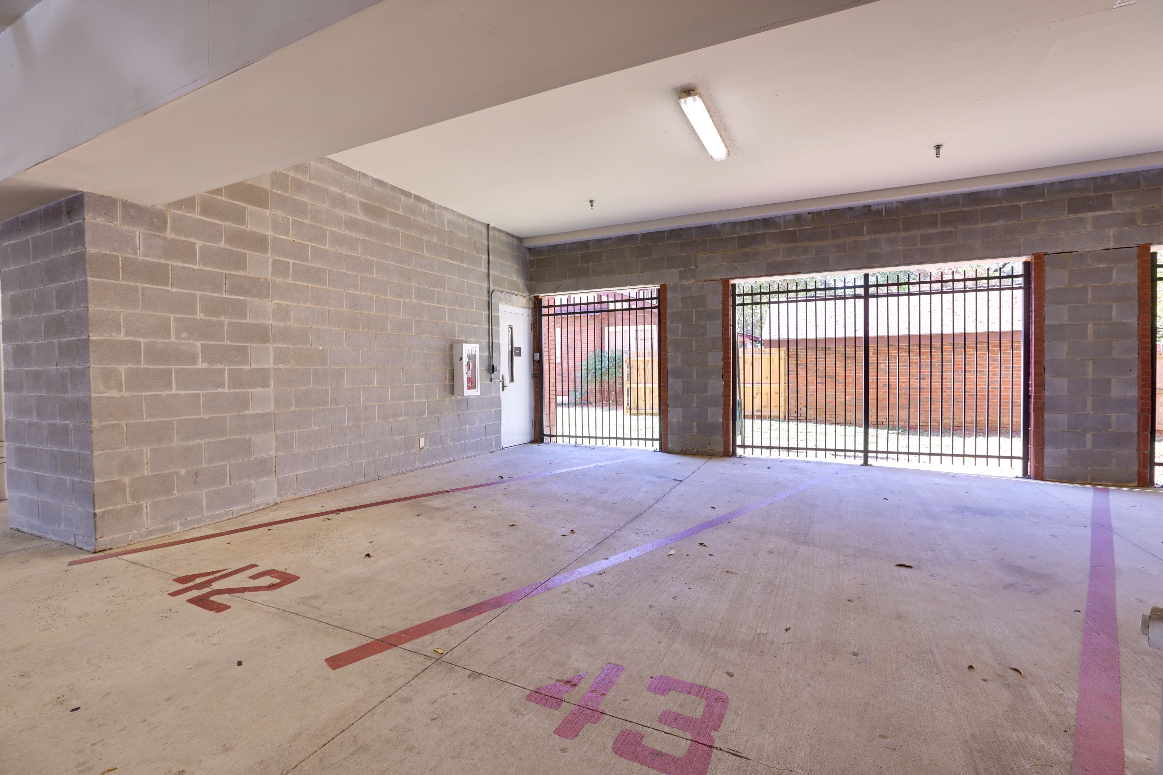 Condo Exterior | Parking | Covered Parking (2 Vehicles) | Free Street Parking